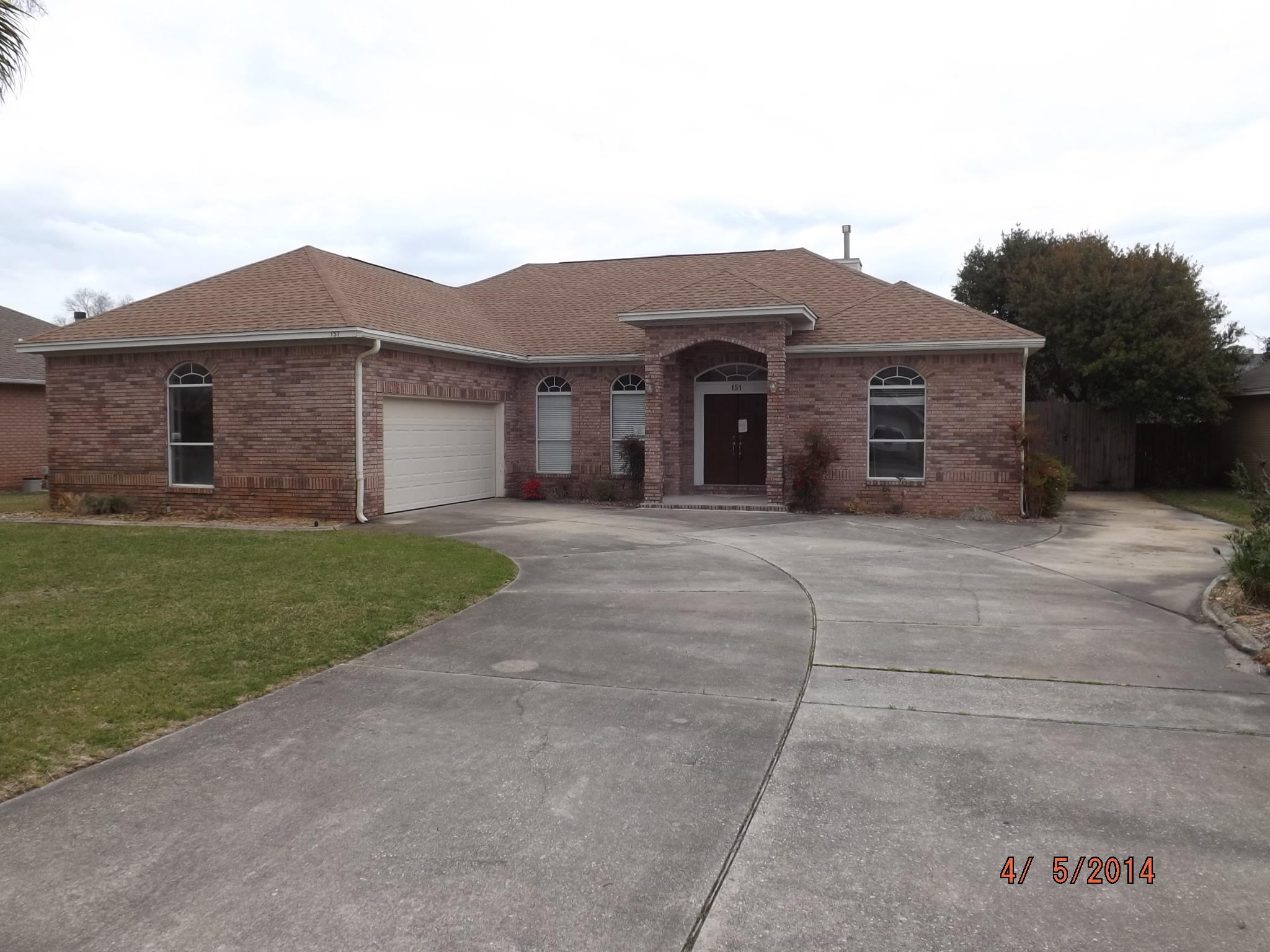 SIGNIFICANT PRICE REDUCTION !!!Wonderful all brick home featuring tall ceilings and large sliding glass doors from 3 rooms that lead out to the covered patio and in-ground swimming pool. Beautiful kitchen with granite tops, center island, breakfast bar and breakfast room. Tiled floors in foyer, dining area, kitchen, baths and laundry room. New carpet in living room and bedrooms and fresh paint throughout.
