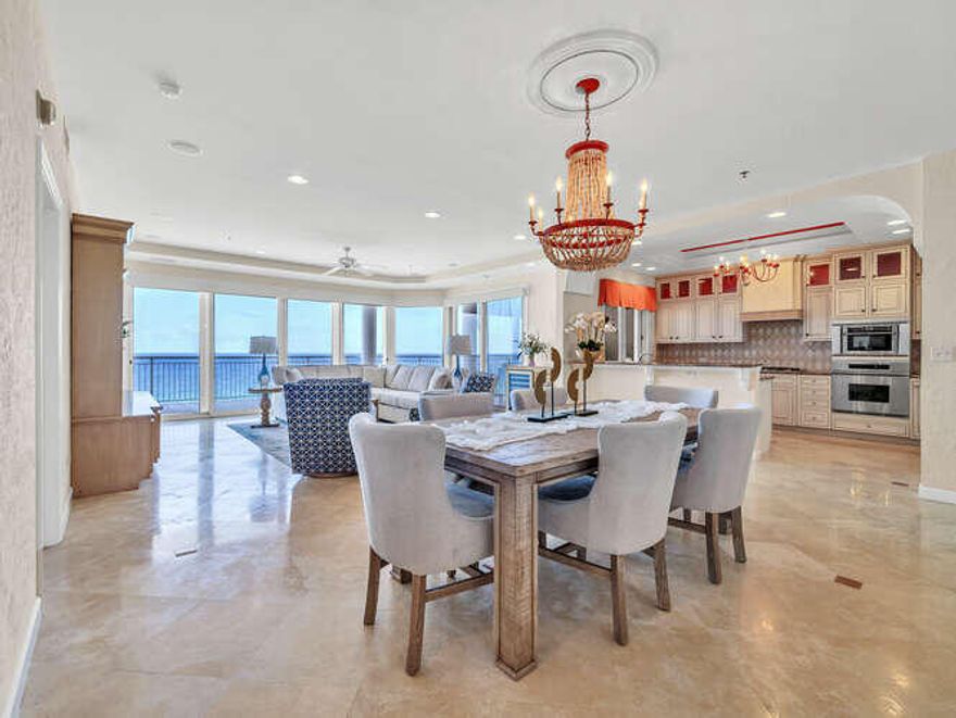 Rare opportunity! Coveted east-end, 4BR/4BA, 9th floor of GRAND VILLAS, a private, gated, non-rental in hidden dunes resort. Unobstructed panoramic Gulf views! Wraparound balcony w/electric hurricane shutters, built-in gas grill & granite countertops. Upgrades/custom finishes include plantation shutters, travertine tile, crown molding, built-in ent. center, new motorized solar shades, wine cabinet/fridge. Kitchen: Sub-Zero fridge, Dacor gas stove, new ice maker, custom cabinets & pantry. Four en suite baths. Huge master w/ Gulf Front views, 2nd master with lake & bay view, a huge office/bedroom with built-in cabinets & large closet. Laundry room w/ sink, custom cabinets & granite countertop. Storage closet, underground parking, Gulf-front pool/spa, exercise room, gated walkway to beach.