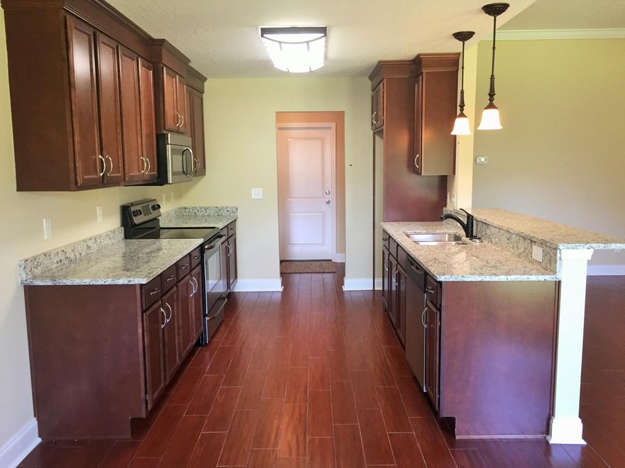 Great Location.. Convenient to Hurlburt Field and just 1 mile from Beautiful Navarre Beach. This 3 bedroom 2 bath boost a great floor plan with high ceilings and great architectural flare.Loaded with Granite, stainless Steel appliances and upgraded light fixtures throughout. Home will be completed in Late September.