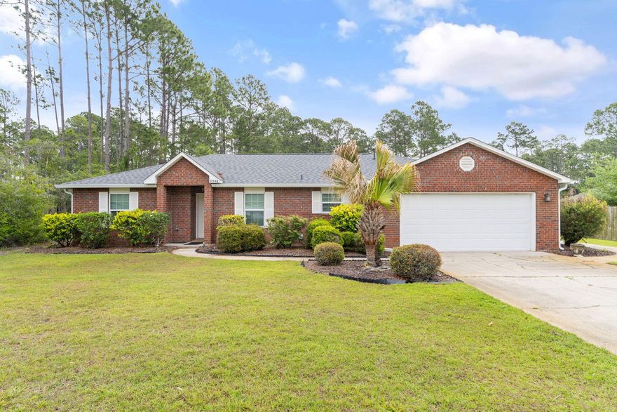 WHEELCHAIR ACCESSIBLE 3 bedroom, 2 bathroom brick home in Holley By The Sea. This home is on over .6 acres of land with an almost 250 sq ft shed/workshop that will house a small boat or jet ski.  The large yard has plenty of room for a swimming pool.  Outside is also a newly poured concrete, wheelchair accessible ramp into an over 350 sq ft sunroom with vaulted ceilings and mini split heat and air so it can be enjoyed year-round. Inside is a large kitchen that opens up into the living room. The kitchen has white cabinets, a farmhouse sink, pantry, tile backsplash and reverse osmosis water storage tank. Refrigerator and dishwasher convey and seller will give credit for an electric OR gas stove/oven. Adjacent to the kitchen is a semi-formal dining room. This home offers a full-size laundry with a washer and dryer that convey. The large master bedroom has french doors leading to the sunroom and barn doors leading to the master bathroom.  The master bathroom is handicap friendly with a zero-entry full size shower, separate water closet, dual sinks and his and her closets.  There is no carpet here...the entire home is vinyl plank or ceramic tile. Split bedroom concept with two additional bedrooms and bathroom on the other side of the house. Added to this home are: a whole house generator in 2022; new windows, garage door and gutters since 2020, roof in 2021, HVAC 2016, and water heater in 2021.  This home has been meticulously maintained and is in the prime location of Holley By The Sea offering a gym, swimming pools, RV Park, pickleball, tennis and club house.  Best of all, this is one of the few homes in Holley By The Sea with public sewer, no need to maintain a septic system. 
