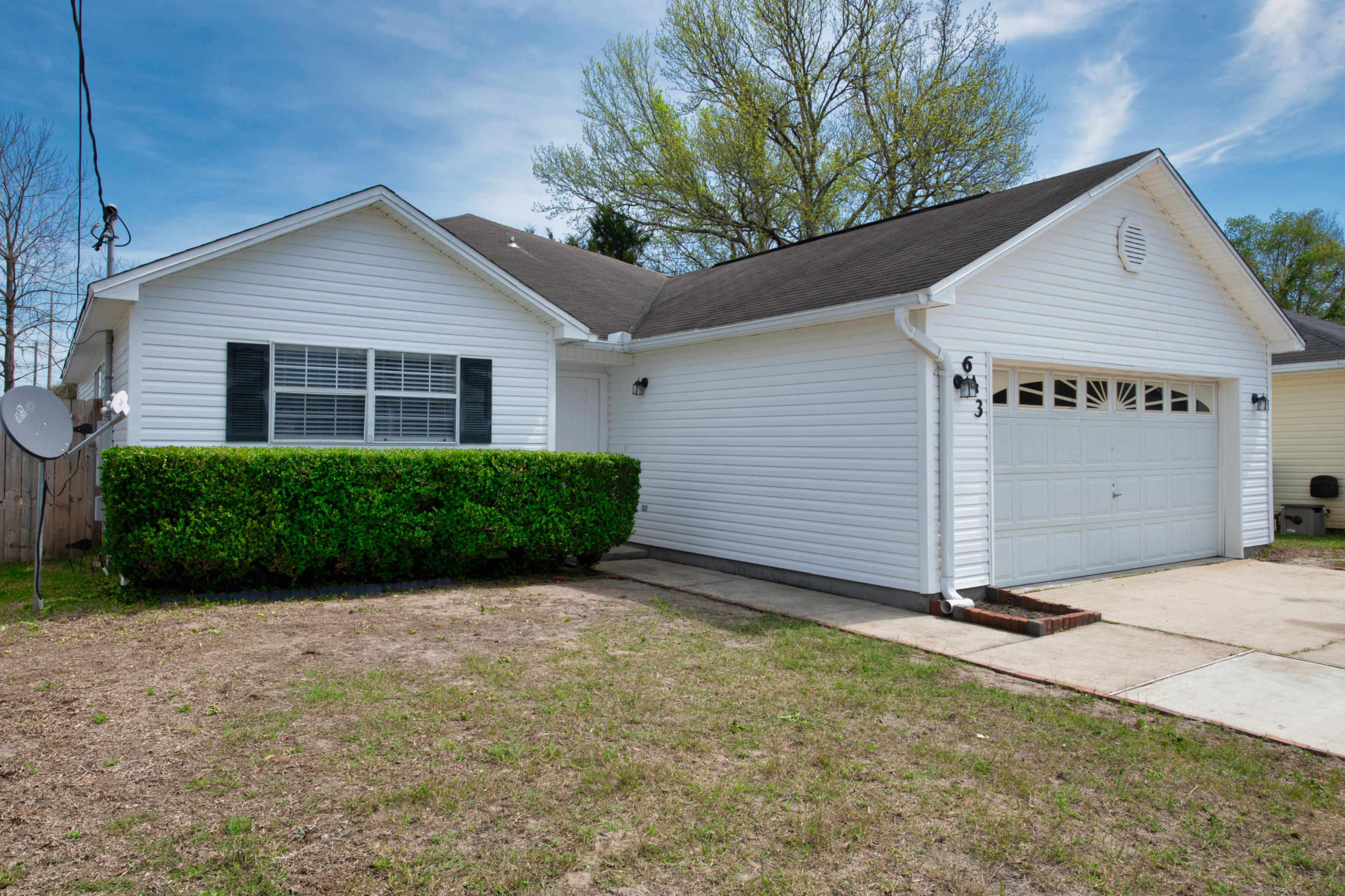 Beautifully renovated home in the heart of Fort Walton Beach. GREAT LOCATION- close to both bases, shopping, schools, & hospitals. This fantastic home offers split bedroom plan ceramic tile flooring in foyer, kitchen,dining area and bathrooms. Amazing engineered flooring in living room and bedrooms. Trayed ceiling. Dining room and breakfast bar. French doors lead to covered porch adjacent to living room. Large sink inside the garage and auto garage door opener. Privacy fence and sprinkler.