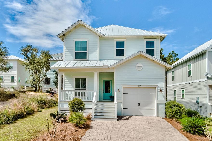 Experience this tasteful beach getaway that comes fully furnished and ready to go in Grande Pointe at Inlet Beach.  This open floor plan comes complete with hardwood floors, quartz countertops, crown molding, a 1st Floor master, garage, a second living room/bonus room, and a private back patio.  Other notable finishes are: a large gas cook-top, stainless steel appliances, tankless hot water heater, vent hood and much more!  The location is the gem with a short drive to one of the largest beach accesses in the area on Orange street.  Grande Pointe is located in the highly sought after area of Inlet Beach and provides quiet tranquility within an upscale neighborhood featuring a dock on Lake Powell and a resort style pool that also fronts Lake Powell.  Your just over a mile from the shops and