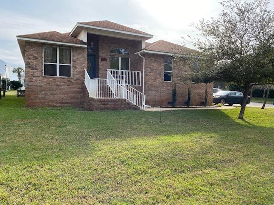 LIKE NEW, CUSTOM BUILT, 3 bedroom 2 bath home with many upgrades!  DEEDED WATERFRONT ACCESS! Quality construction, style and sophistication throughout. The Office, with private entrance, can serve as a 4th bedroom!  A Large Formal Dining room is at the entry. The Huge Kitchen has an abundance of Wood Cabinets, Beautiful Granite counter tops and an Island! There is a Large Pantry, Elegant Appliances & a Breakfast Bar that opens to the Living Room with Electric Fireplace! 10ft ceilings throughout, Bose Surround sound is in the living room and on the outside patio!  Phone, cable and network wiring throughout. The Master Bedroom has a Tray ceiling w/decorative lighting. The Master bath has a Large Walk-in Closet, Walk-In Shower and Jetted Garden Tub! The spacious laundry room is inside.