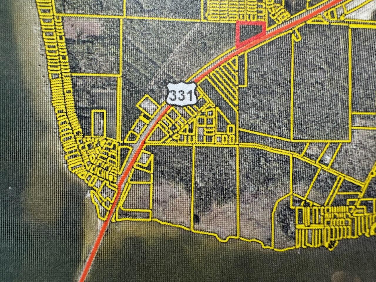 Fabulous land grab opportunity to capture over 5 acres of commercial acreage on a corner lot with 600 feet of frontage along 331 South just 1/2 mile north of the 331 Bridge.