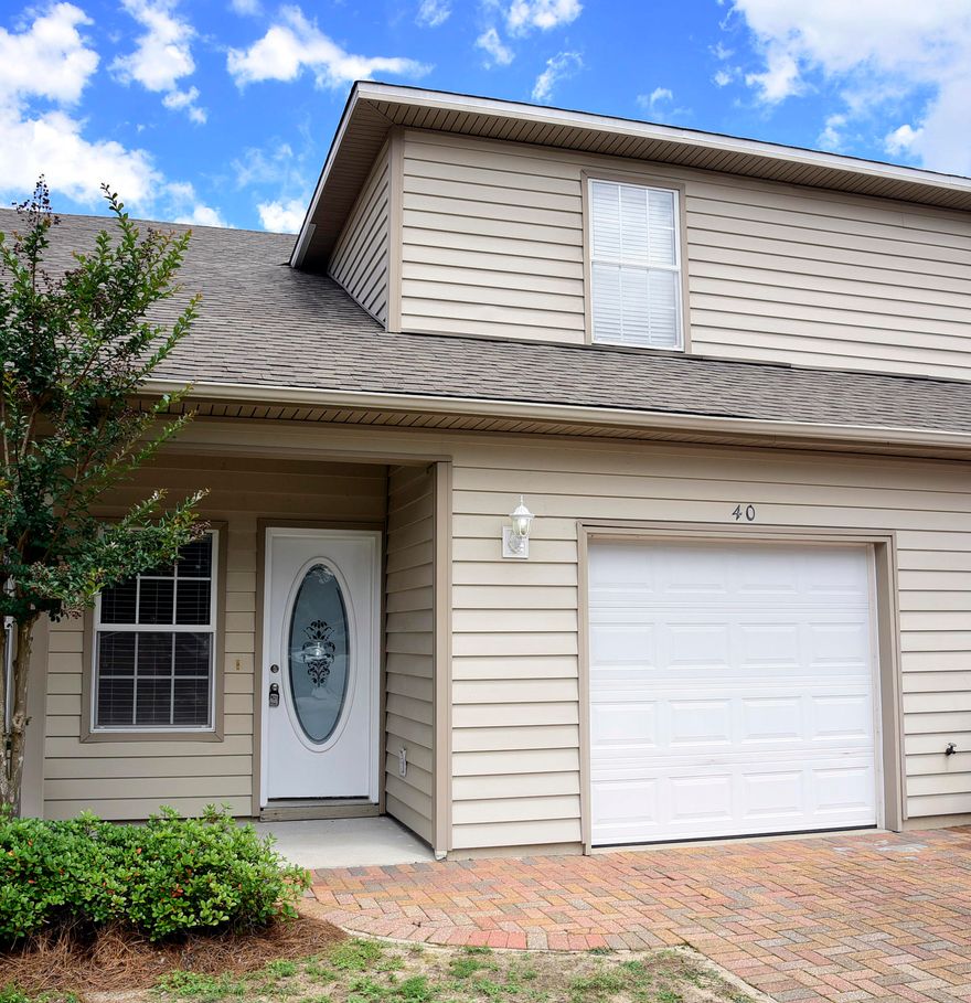 Come see this wonderful townhome in a great location!  You'll be close to Eglin AFB and all the amenities living on the Emerald Coast has to offer. Upon entering you'll find an open floor plan with with wood look laminate flooring in the great room, an oversized dining area and tiled kitchen. The kitchen has plenty of cabinets, granite countertops and stainless appliances as well as a breakfast bar. There's also a half bath on the first floor.  Upstairs there are three bedrooms and two full baths.  The master has wood look flooring, two closets and a large adjoining bathroom. Added features are the attached garage with washer/dryer hook-ups and an open patio in back.