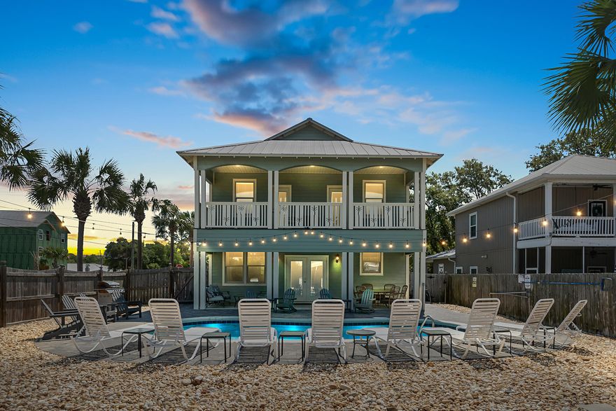 Welcome to the pinnacle of luxury living! Nestled at the exclusive northeast corner of Crystal Beach, this impeccably maintained home is the epitome of sophistication and convenience. Whether you're seeking an exceptional investment property, a serene second home, or the perfect forever residence, this property checks every box. With 7 spacious bedrooms, including FIVE lavish master suites, 5.5 pristine bathrooms, and over 2,800 sq. ft. of meticulously designed living space, every detail exudes elegance. Enjoy the ultimate outdoor experience with a private, heated pool and ample parking for all your needs. This stunning property promises not only impressive returns but also an unforgettable experience for guests, ensuring repeat clientele. Opportunities like this are rare--act swiftly! Indulge in the serenity of a luxurious King bedroom, featuring an en-suite bathroom with a sleek stand-up shower, creating the perfect retreat. A second King bedroom awaits with an elegant en-suite bathroom, complete with a deep soaking tub and a separate walk-in shower, providing the ultimate spa-like experience.

2nd Floor Bedrooms:
The opulent second floor offers another King bedroom with a private en-suite bathroom for ultimate privacy and comfort. A second King bedroom enjoys access to a Jack & Jill bathroom, ideal for family or group stays. Two Full-over-Full bunk beds with their own Jack & Jill bathroom, featuring a double vanity and a tub/shower combo, ensures ample space and style for everyone. A fourth King bedroom with an en-suite bathroom opens to a private balcony, offering stunning views. For the young ones or the young-at-heart, two Twin bunk beds with balcony access provide the perfect space for rest and relaxation.

LIVING AREA & KITCHEN

Step into the heart of the home, where the living area is designed for both relaxation and elegance. A plush sectional couch, complemented by two accent chairs, invites you to unwind in comfort. Centered around a sleek TV, the space is perfect for both intimate gatherings and grand celebrations.

The expansive open-concept kitchen and dining area seamlessly flow into the living room, creating a perfect environment for family gatherings and entertaining. The gourmet kitchen is fully equipped with top-of-the-line appliances, endless granite countertops, stunning cabinetry, + more! All the essentials are at your fingertips. Gather around the dining table, seating 12 in style, or enjoy a casual bite at the breakfast bar, offering seating for 8.

The laundry room, complete with a full-size washer and dryer, an iron, and an ironing board, adds a touch of practicality to your luxurious stay. A convenient half-bathroom is located just off the hallway for easy guest access.

OUTDOOR SPACE & AMENITIES
Step through the French doors and into your own private outdoor oasis. The expansive, fenced-in backyard offers ultimate privacy and tranquility. The large, heated pool is the centerpiece of the outdoor space, surrounded by ample seating. Whether you're lounging in the sun or enjoying a meal al fresco, the dining table for six provides the perfect setting for poolside dining. This luxurious backyard promises the ultimate retreat for both relaxation and recreation.