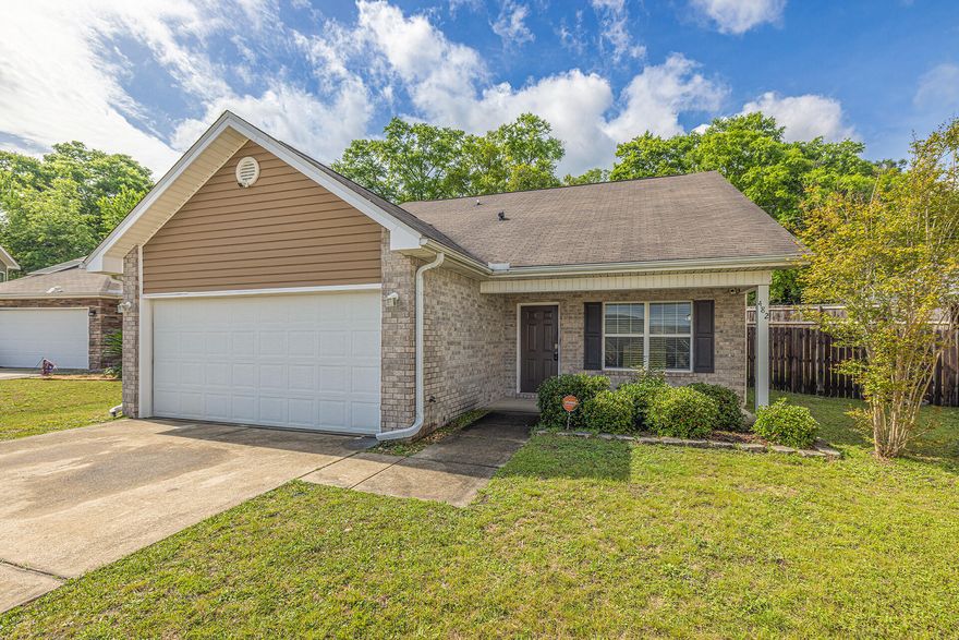 Fantastic two story home in the lovely community of Stillwell Estates with 5 bedrooms, 2 1/2 baths with the Master Bedroom conveniently located on the first floor. The Master Bathroom has a garden tub, separate shower and double sinks. This home has the desirable open concept and the  kitchen has a breakfast bar, pantry, black appliances and lots of beautiful dark cabinets. The guest half bath is located just around the corner. In the family room you will find a modern built in gas fire place and lots of space for entertaining.  The other bedrooms are located upstairs with the shared bathroom. The laundry room comes with a washer and dryer. Outside there is an open patio and fenced in yard. This home is close to Duke Field, 7th Special Forces, restaurants and shopping.