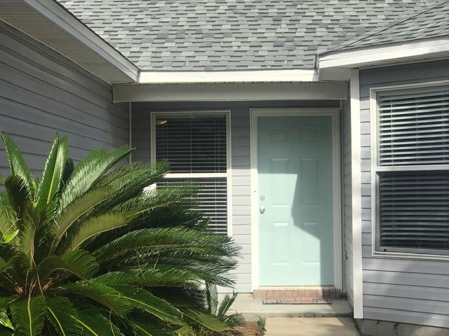 Welcome home! Awesome home centrally located between Navarre and Hurlburt Field. Totally updated inside! Great sized living room that opens to the dining room and kitchen. Beautiful granite counters in the kitchen. Stainless appliances. No carpet in the house! Split floorplan with the master suite off the dining room and the other two bedrooms are off the living room. Covered back patio so you can enjoy your morning coffee while watching the birds in the backyard. Two car garage and plenty of parking. Huge fully fenced backyard. Call your favorite agent today to take a look at this one!