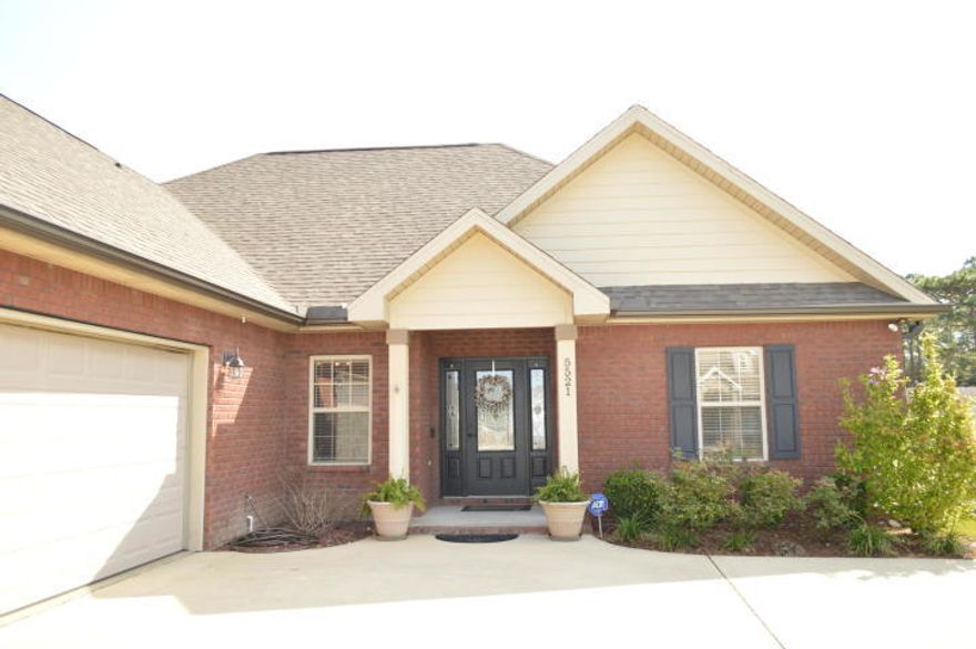 Wonderful 4 Bedroom / 2 Bath home in the sought after gated community of Colony Ridge's second phase! The all brick home features an open floor plan, split bedroom design with eat-in kitchen as well as a formal dining area. The living room opens to the back patio and enclosed heated pool and features a deck and covered porch and a private back yard that is privacy fenced on the sides. There is an upstairs bonus area which may be used as a bedroom, workout room or an office. New hardwood Flooring throughout all living areas as well as the master bedroom. Perfect family home. Large back yard perfect for pets.