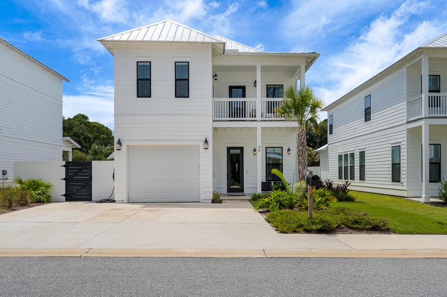 One Block from the Bay, Two Miles from the Beach -- Built in 2023, this 3BR/3.5BA + flex space Destin retreat blends modern design with coastal comfort. Steps from the bay, minutes to sugar-white sands, and adjacent to a quiet park with walking paths, it's ideal as a full-time residence, vacation getaway, or rental investment. Features include open-concept living with a stylish kitchen, first-floor primary suite with spa bath and soaking tub, private balcony, oversized terrace, air-conditioned/heated garage with Tesla charger, and a fenced white stucco backyard for pets or play. Offered fully furnished for turnkey rental, or bring your own furniture and make it home. Shopping, dining, and entertainment are nearby. Motivated sellers--don't miss this coastal gem.