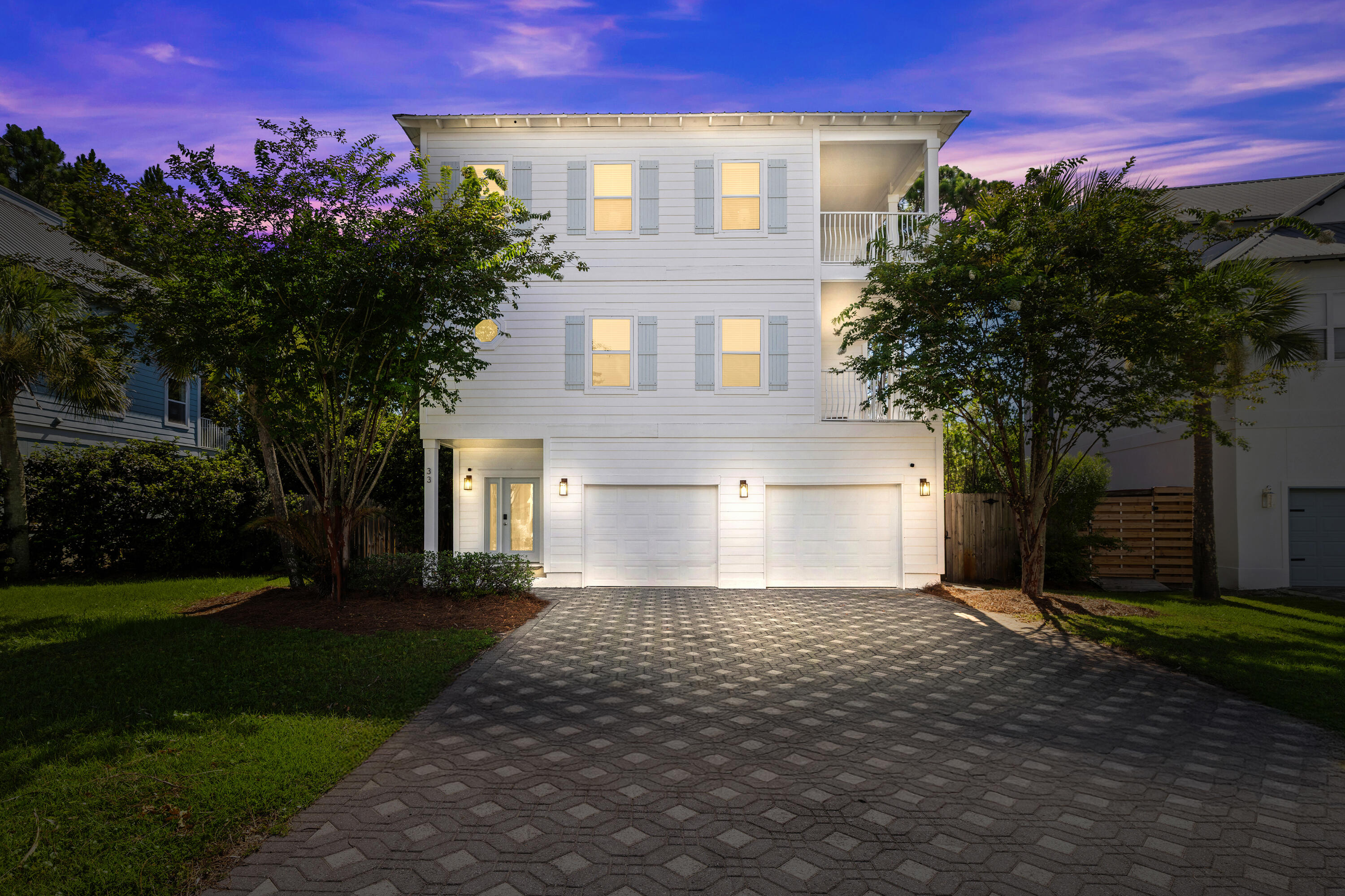Welcome to 33 Cherry Laurel Drive, a sanctuary of elegance and functionality, ideally located just minutes from the iconic sugar-white sands of the Emerald Coast. This exceptional 5-bedroom, 4-bathroom residence sprawls across 3,400 square feet on a 0.26-acre lot, offering abundant space and style for any lifestyle.As you arrive, be captivated by the meticulously crafted concrete pavers and lush landscaping leading to a split 2-car garage. The home boasts a harmonious blend of smart technology and comfort, featuring dual pane windows, two central AC, and a smart thermostat to ensure optimal climate control. The elegance of recessed lighting, chandeliers, and architectural details place this home in a league of its own. Step inside to discover a well-thought-out floor plan. The first floor welcomes you with a cozy bedroom and a Jack-and-Jill bathroom, leading to the garage and a second comfortable bedroom. The spacious living and dining area on the second floor is perfect for gatherings, enhanced by a fully furnished kitchen fitted with modern appliances.
Ascend to the third floor to find the luxurious primary ensuite with a private porch, offering a tranquil retreat. A second master-sized bedroom, a large closet creatively transformed into a bunk room, and additional amenities like a communal pool, jacuzzi tub, and a private yard amplify the home's allure.
Experience a seamless blend of luxury and practicality at 33 Cherry Laurel Drive, where every detail is designed for your enjoyment and peace of mind.