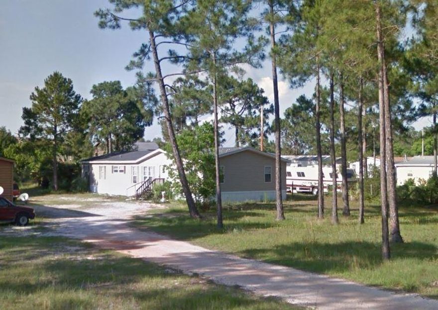 FLIP, BUILD OR CASHFLOW!Don't miss out on this opportunity to grab a large parcel in East Navarre, a developing area, and conveniently located to nearby the beach, restaurant, and shopping!This 4 bedroom 3 bath Mobile Home sits on a 0.52 acre lot, and will need substantial work. The roof and most of the house is original to the home, so it will surely need cosmetic repairs/updates throughout, AC and Heating are not functional, and it will need some landscaping as well.Despite what it needs, rents are actually going anywhere from $1.3-$1.8K, and new-builds selling at $350K-400K+, this property definitely has a lot of potential whether as a FLIP, BUILD, or a Cash Flow investment!OCCUPIED - DO NOT DISTURB