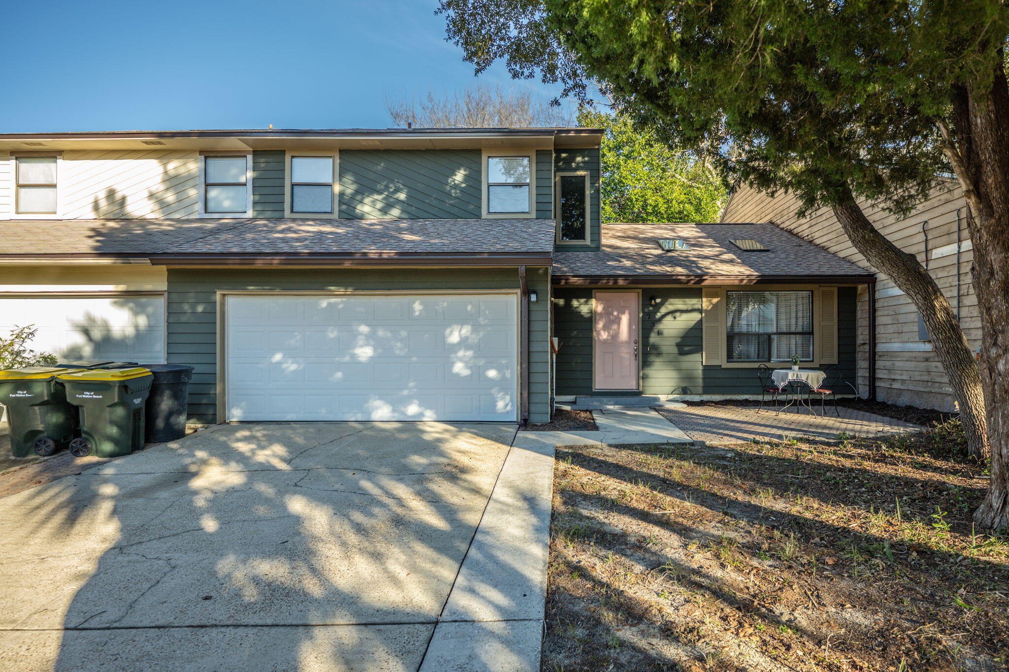 Charming 2-Bedroom, 2.5-Bath Townhome in Prime LocationThis updated 2-bedroom, 2.5-bathroom townhome offers 1,697 sq. ft. of comfortable living space and is ideally located just 6 miles from Hurlburt Field, 7 miles from Eglin Air Force Base, and 7 miles from the sandy shores of Okaloosa Island. Convenient amenities such as Publix, Home Depot, T.J. Maxx, parks, schools, and various shops and services are all nearby, providing easy access to everything you need.The home features a paved front patio, a great spot to relax with a beverage and enjoy the outdoors. Inside, natural light pours in through skylights, accentuating the open layout of the living and dining areas. The large rooms are complemented by tile flooring and raised ceilings, contributing to the bright, airy feel. A wood-burning fireplace in the living room adds warmth during cooler evenings.
The separate, spacious dining room is ideal for hosting guests or even creating a multi-purpose space with room for a large China cabinet or a desk. The kitchen offers quartz countertops and ample cabinet space, perfect for everyday cooking. A convenient laundry room with additional storage and under-stair storage provides added organization. Upstairs, both bedrooms are generously sized, and each has its own private bath. The master suite includes a large walk-in closet and an updated en-suite bath with a walk-in tiled shower and modern vanity. The secondary bath offers a shower/tub combo. Step outside to the covered back patio deck, which has been freshly painted and includes an overhead fan for added comfort. The home also features a 2-car garage for secure parking and additional storage space, along with a privacy-fenced backyard for added outdoor privacy.
