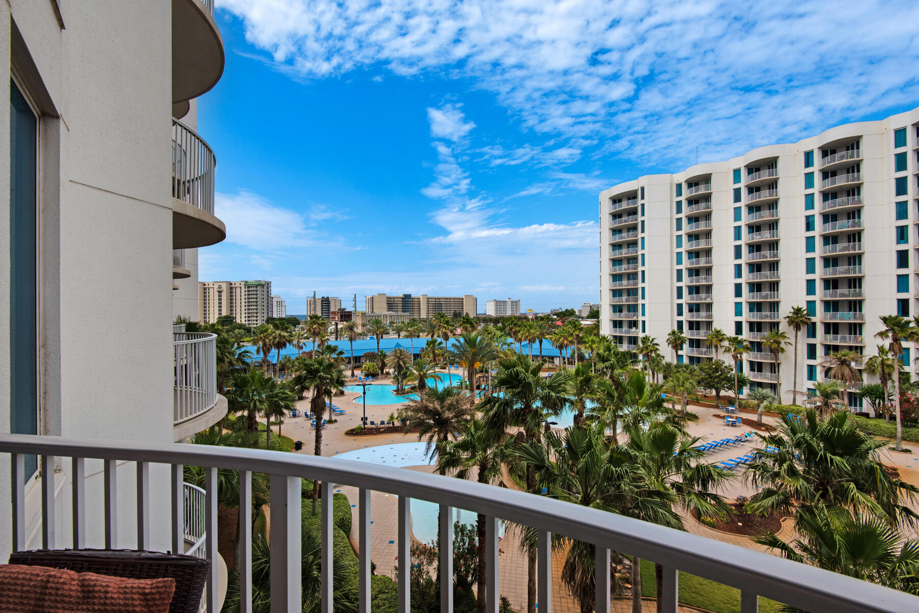 Come enjoy the beautiful pool views from this two bedroom, two bath unit in Tower 1 at The Palms of Destin. This resort features and onsite restaurant, a pool bar, hot tub, and a large resort style pool, as well as tennis, pickelball, basketball, and a childrens playground. Located one block from the worlds most beautiful beaches, you and your guests will truly enjoy your time at this special resort. New HVAC installed in 2022, and new sleeper sofa in the living room. The master bedroom features a new mattress and has poolside views and the spacious living area is perfect for hanging out in the evening and catching movie or sunset. The gated garage offers covered parking, and the resort is surrounded by various restaurants and shopping. It's time to make this beauty your own.