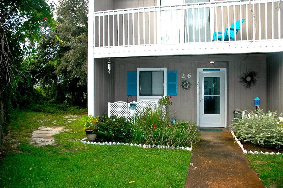 Please submit back up offers.Highly desirable end unit, 2-story townhouse in a great location close to the beach, grocery, and the Destin harbor. The unit features 2 large bedrooms with in suite full bathrooms and large closets. Kitchen was remodeled in 2013 with stainless steel appliances including dishwasher, refrigerator and built-in microwave. Large pantry with breakfast bar. New cabinets and counter tops. AC unit was replaced in 2013. Downstairs laundry. Wood grain laminate floors upstairs, tile downstairs. New bathroom vanities and toilets. Wood burning fireplace. Lots of storage! Large community pool.