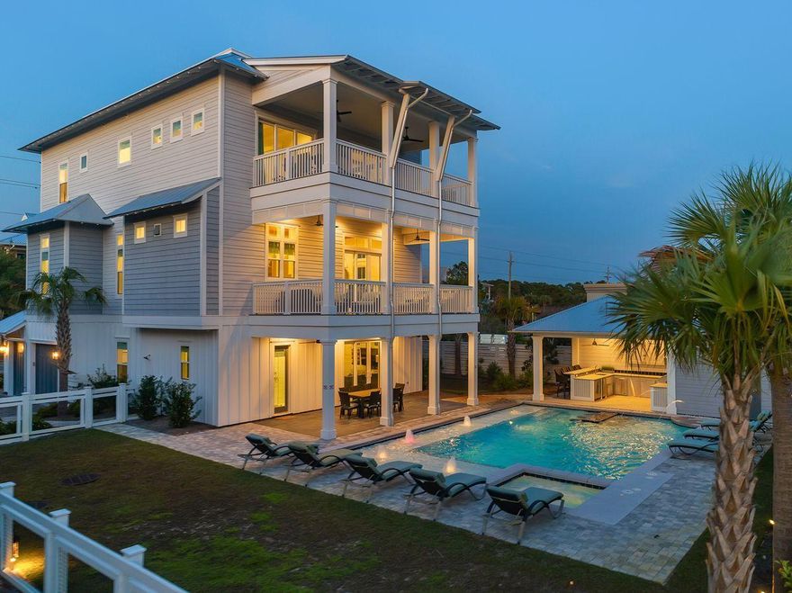 Masterfully built and thoughtfully designed, this exemplary new construction built by Betterbuilt of Northwest Florida is prominently situated on the west end of 30A and presides over an impressive elevation yielding unparalleled panoramic gulf and sunset views from the beautiful top floor open deck. Professionally rendered with coastal contemporary decor, this home was built as a legacy property, perfect for multi-generational living or as a top producing short term rental ($200K-$250K+ annual projected income) offering optimal accessibility from the private elevator which accesses all four levels as well as ample indoor and outdoor living spaces.