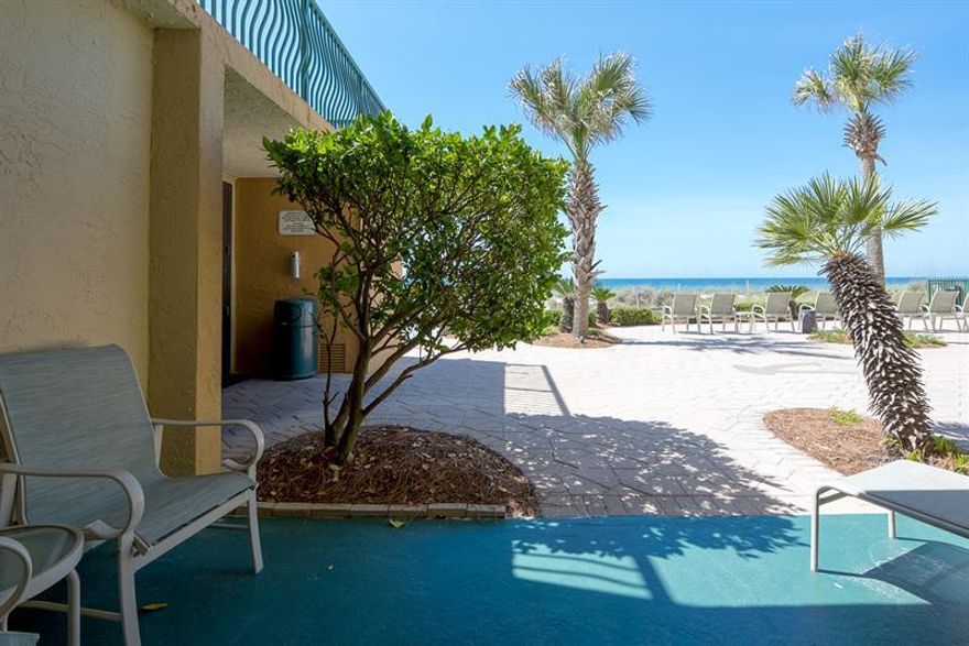 A quaint 3-story building, the unit is located directly on the beach in the heart of Destin. A one bedroom fully equipped unit, with a king-size bed in the master bedroom, two bunk beds built into an alcove in the hallway, full-size kitchen, bath and a half. This unit is located on the ground floor and you can walk directly out your sliding glass door to the patio which is directly beach front with a gorgeous view. Come take a look you won't be disappointed. Destin Realty, Inc. is the on-site rental management company with over 30 years experience in the property management business.