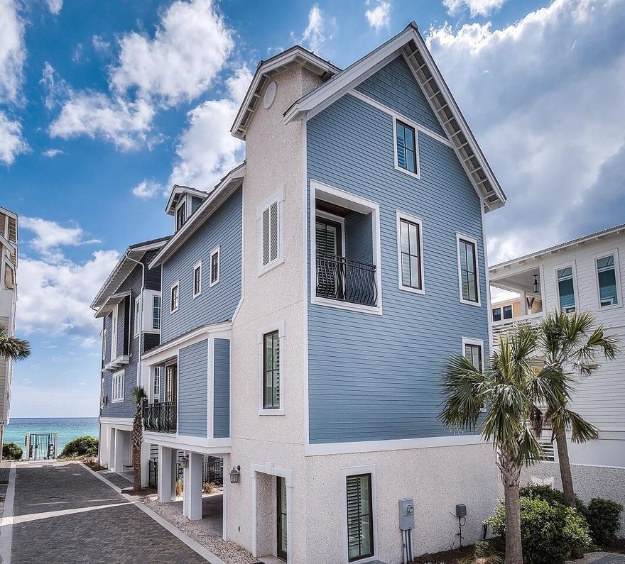 Welcome to 244 Winston Lane - Exquisitely located near the Gulf in Inlet Beach, this property is designed with a luxurious 30A lifestyle in mind. As you enter the driveway to the residence, you are greeted by a view of the Gulf just outside the private beach access for the Bluffs at Inlet Beach neighborhood. Offering covered parking & a reserved parking spot outside, the ease of access to this property is magnificent. You are greeted by a foyer, perfect for tossing off your flip flops. And upstairs resides a masterful kitchen with gorgeous white marble countertops & plenty of bar-seating. The living space is furnished perfectly with elegance at heart. Just off the formal dining area is a private balcony, perfect for unwinding and taking in a view of the Gulf.