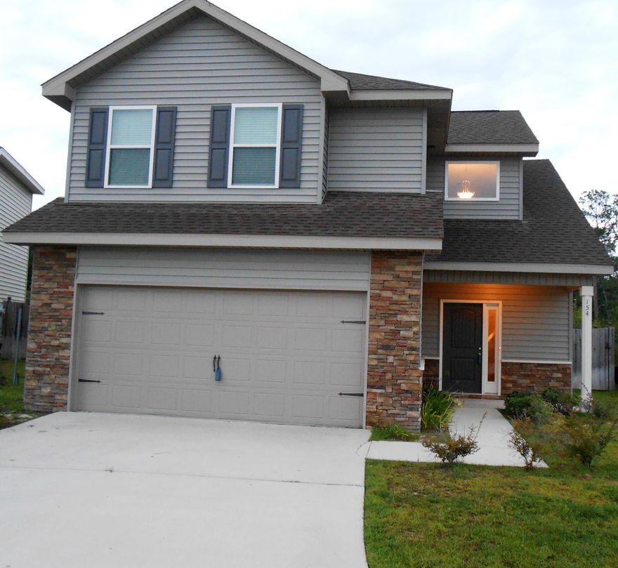 This beautiful 2038 sq ft home is immaculate! Stone accents in front welcome you to your new home located in The Cottages at Sandy Ridge. This neighborhood features a community playground just across the street. Located south of I-10 and just minutes from Duke Field or the 7th Special Forces Group. Eglin AFB and Hurlburt Field are just a short drive down Hwy 85. This 3 bed, 2 -1/2 bath home is flawless inside and out. The spacious tiled entryway leads to a lovely living area featuring a fully upgraded kitchen. High-end appliances and granite countertops make this kitchen a winner! Tons of storage, an office, laundry room, half-bath and 2-car garage complete the first floor. Upstairs opens to a great loft area and a heated and cooled bonus room. The carpeted Master bedroom features a