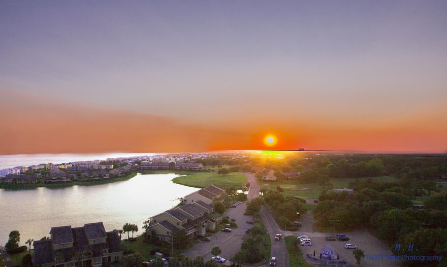 REDUCED PRICE!!!! Owner is extremely motivated. The time to make an offer is now. Recent rental projections of $42,500, solid investment. Awesome views of the Bay, Coastline, Gulf, Lake and Golf Course from the 8th floor corner location. Unit would be great for permanent living or would rent(40K minimum)as a vacation rental with quality touches throughout. Unit has been completely redone (70K in upgrades) with numerous updates, including beautiful porcelain wood flooring, a gorgeous walk-in-shower in the master bathroom, new granite countertops in kitchen and 3 bathrooms, also all new updated cabinets. Upgraded LG appliances including front loading washer and dryer. Must see to appreciate.