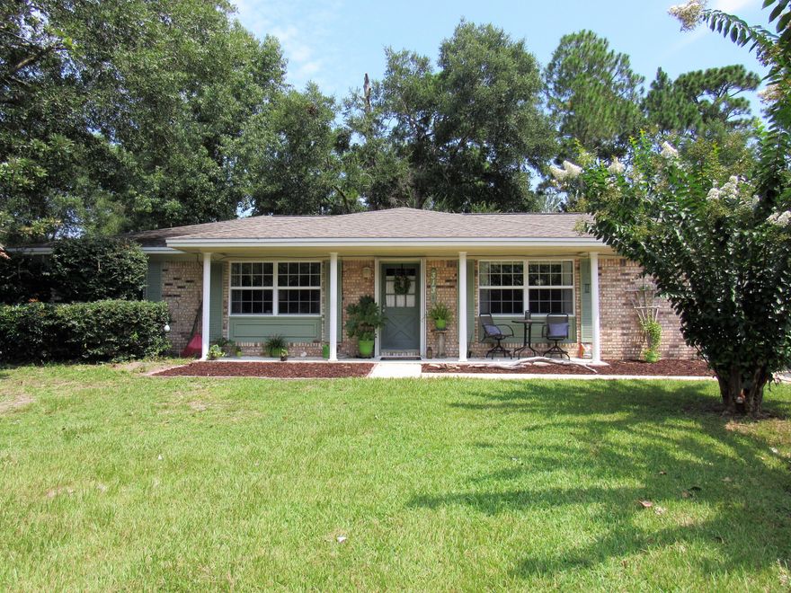 Completely Updated Home!! LVP floors throughout - no carpet, tile in bathrooms, with newly painted modern clean colors throughout. New: lighting, ceiling fans, baseboards, crown molding, master vanity, gray cabinets and light granite in kitchen. Fully fenced backyard. Every room updated!! Newer roof and hvac. Hurricane panels for all windows. Don't miss out on this gem in a great location!!