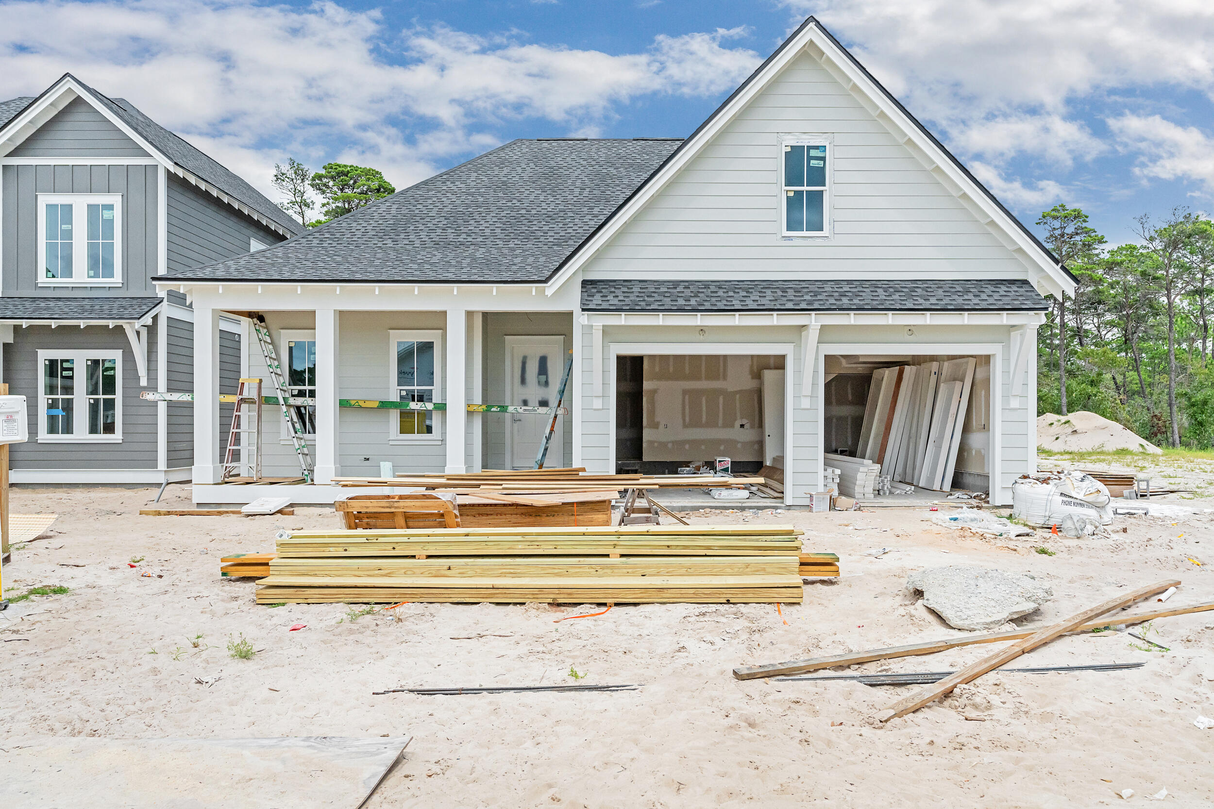 Experience luxury living in the Kellie Plan, a stunning new construction home in Powell Landing East. Thoughtfully designed by Arkon Group, this 4-bedroom, 3.5-bathroom home spans 3,097 sq. ft. of conditioned space, including a finished bonus room and 418 sq. ft. of covered porches. Inside, 10' ceilings, crown molding, and premium engineered wood flooring create an elegant backdrop. The gourmet kitchen showcases Wolf & Sub-Zero appliances, stacked cabinetry with lighting, an extended island, quartz countertops, and a herringbone tile backsplash. The living room features a cozy fireplace, while frameless glass shower enclosures and designer tile selections elevate the bathrooms. Step outside to your private oasis, complete with a 12'x20' heated pool, paver pool deck, screened porch with outdoor fireplace, tongue and groove ceiling, and a gas stub for grilling. A gas lantern on the front porch adds to the charm. Additional features include a two-car garage with an EV/golf cart plug, making this home as functional as it is beautiful. Located in the desirable Watersound Origins community, this home offers the perfect blend of luxury, comfort, and coastal elegance.
Estimated completion is September 2025.
Experience refined coastal living in one of Watersound Origins' most sought-after neighborhoods nestled alongside Lake Powell. The Watersound Origins community offers an unparalleled lifestyle in South Walton - exceptional amenities, notoriously friendly and welcoming atmosphere, zero short-term rentals, and close proximity to all that 30A and Inlet Beach has to offer. Enjoy the zero-entry pool, playground, sports courts, and fitness center at the Village Commons, play a round of golf or foot golf at the Origins Golf Course, or take a walk along the many miles of walking and biking trails that wind all throughout the neighborhood! The new Watersound Town Center located at the entrance to the community offers several fantastic dining options (casual and formal), medical services, Starbucks, Publix, a Pavilion that hosts events year round, and more!