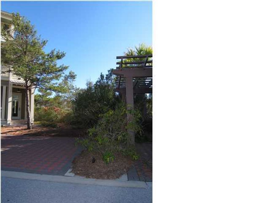 Great lot in Seacrest. No build-out time! Gulf views possible. Lot is located near the pool and in the front of development. One tap Fee paid. Listing Broker/Salesperson has ownership interest in the property.