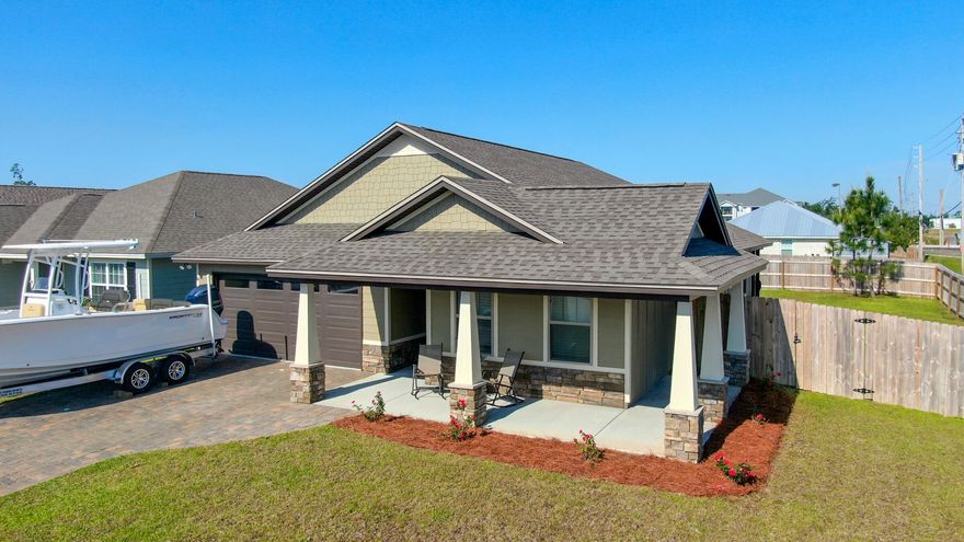 CURRENTLY UNDER CONTRACT, SELLER ACCEPTING BACKUP OFFERS *Seller is offering up to $4,500 towards seller's closing costs on an approved deal.*  You don't want to miss this beautifully built craftsman style home built by Nowell Construction, situated on a large corner lot with a wrap around privacy fence.  Inside the home, you'll find wood tile flooring, granite countertops, gorgeous custom built soft-close cabinets, stainless steel appliances, and recessed LED lighting throughout.  The master bathroom includes a walk-in shower and double vanity.  The exterior of the home includes a brick paver driveway, Hardie Board siding, and an irrigation system.  **Seller to provide washer/dryer and refrigerator move in package upon approved deal.**