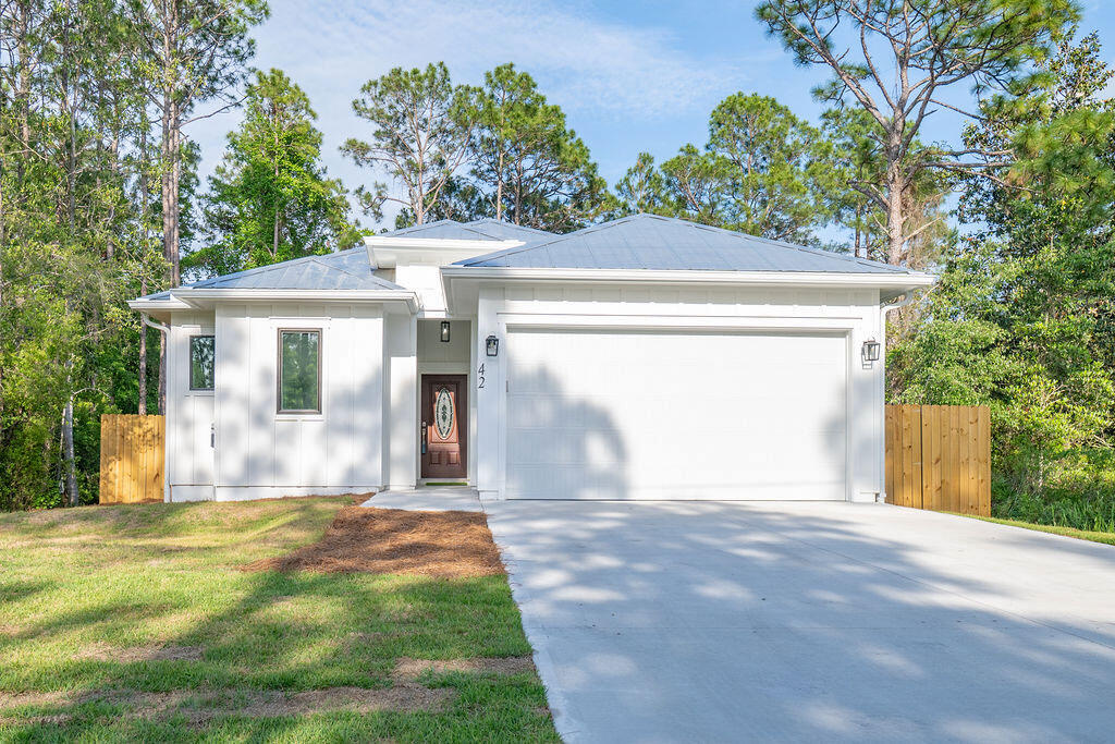 Are you looking for a brand new home in the desirable area of Santa Rosa Beach? Whether you're searching for a primary residence or a solid investment property with no HOA restrictions, this home is ready for you.This brand-new home offers 1,880 square feet of heated and cooled living space, with a total building size of 2,435 square feet. It includes 4 bedrooms and 2.5 bathrooms and features a modern coastal design with an open-concept layout and high-quality finishes.This home is built on a solid concrete slab foundation, providing stability and durability. It features 10-foot ceilings, quartz countertops, hardwood floors, stainless steel appliances, and abundant natural light. The oversized garage features a protective epoxy-coated floor, offering a long-lasting, low-maintenance surface, and provides ample space for a golf cart, equipment, or additional storage.
The fully fenced backyard provides privacy and a safe space for you and your beloved pets.
This home is a dream for outdoor enthusiasts, with plenty of activities nearby, including golf courses, hiking trails, and beautiful state parks. The Cessna Landing Boat Launch Park is less than half a mile away, and you're just minutes from multiple beach access points along 30A, perfect for enjoying the sugary beaches of the Emerald Coast.
Conveniently located near top-rated hospitals and medical centers, as well as fine dining, grocery stores, and shopping centers, everything you need is just a short distance away.
This home is completely move-in ready. Whether you're looking for beach living, rental income, or both, the choice is yours.
Call today to schedule your showing!