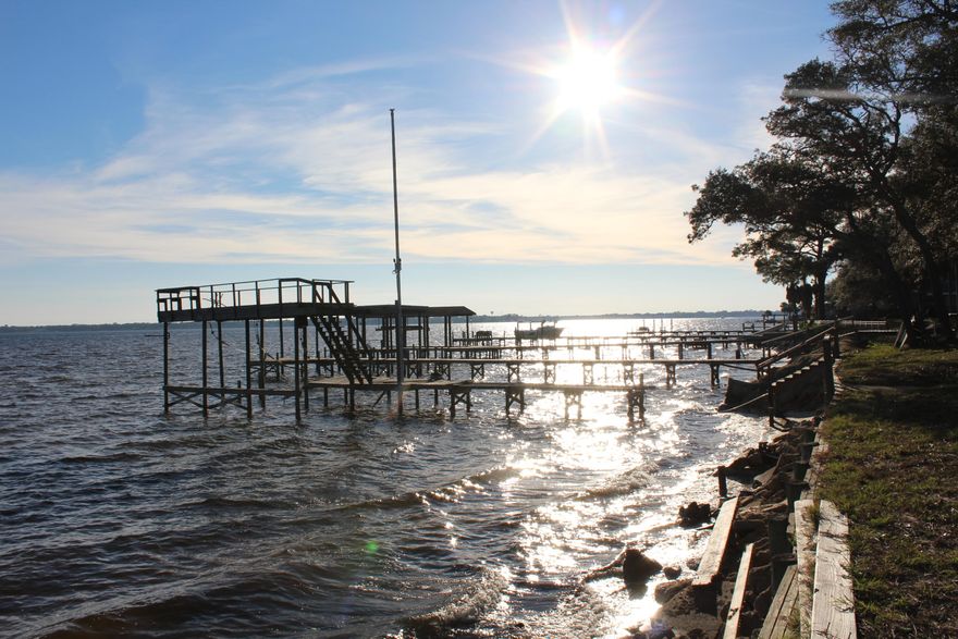 Short sale. Spectacular views of the Choctawhatchee Bay from the kitchen, sunroom, living room, and master bedroom! Enjoy the lifestyle of boating up to your dock or relaxing in your backyard while watching the fabulous sunset over the bay. This waterfront lot is high and dry and has approximately 115 feet of water frontage. The lot is approximately .6 acres and has beautiful mature vegetation and landscaping in the front and back yard. There are expansive views of the bay from the back yard and many rooms of the home! This home features 4 bedrooms and 2 baths with 3241 sq ft. Renovate this home and maintain the original charm and character or build a new home on this oversized lot on the Bay. Shalimar is a very desirable location with excellent schools such as Shalimar Elementary,