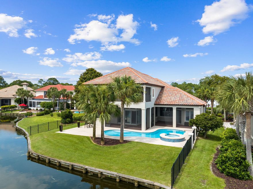 Welcome to 499 Regatta Bay Blvd, where modern elegance meets timeless charm. Nestled in the desirable Regatta Bay community, this meticulously remodeled home offers a perfect blend of sophistication and comfort with captivating sunsets sitting on one of the community lakes and the 16th hole tee box right across the water. Step inside this 5-bedroom 4 bath home to discover a seamless fusion of contemporary design and tasteful appeal. This home was completely remodeled in 2022 including a brand new whole home generator, new Rinnai hot water heater, Quartzite counters throughout, custom cabinets throughout, antique newel accent post from England on the stairs, pecky and sinker cypress accents, 150+ bottle wine room, whole home water filtration/softener system, reverse osmosis water system, new outdoor kitchen, pool resurfaced and retiled, new driveway for ample parking, walk-in attic storage, 3 car garage with 3rd bay climate controlled, and new AC installed in 2024. 
 
The gourmet professional grade kitchen is a chef's delight! Boasting top-of-the-line appliances, including a built in Miele coffee maker, integrated Bosch drawer microwave, 2 Miele dishwashers, and much more. 

Retreat to the serene master suite, complete with a spa-like ensuite bathroom and a pair of spacious walk-in closets for abundant storage. Additional bedrooms offer versatility and flexibility to accommodate your lifestyle needs.

Outside, the beautifully landscaped yard provides a peaceful oasis for relaxation and enjoyment. Great for hosting with the outdoor kitchen and spacious enclosed patio or just unwind after a long day with the breathtaking sunsets this home captures. 

Convenient proximity to the beach, shopping, dining, and entertainment options, this home offers the perfect combination of luxury and convenience within the esteemed Regatta Bay golfing community. Don't miss your chance to make this exquisite property your own. Schedule your private showing today!
