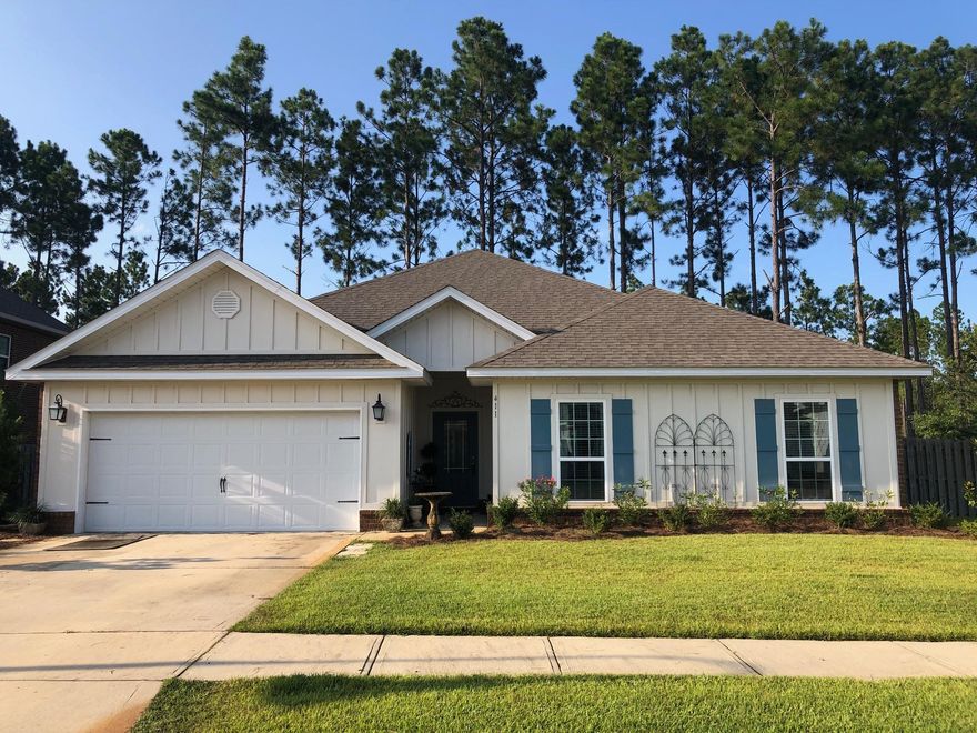 OPEN HOUSE Sunday 8/8 from 1:00pm - 3:00pm!! BETTER than new home in the Central Park community of Hammock Bay, a 3,000-acre bay front master-planned residential community nestled in the quiet surroundings of Freeport, Florida. This ''Victoria'' split bedroom floorplan features an open floorplan, 4 good sized bedrooms and 2.5 baths raised ceilings and gorgeous tile flooring in the living area. When you enter this home through the charming foyer you will find yourself in the beautiful living room that is open to the nicely appointed kitchen and large dining area. The open kitchen features granite counters, stainless appliances and a large breakfast bar island. The master suite is oversized and is complimented by a luxurious master bath with a dual sink granite topped vanity,  separate soaking tub, large shower and enormous closet! The three additional bedrooms are also good sized and the second full bath also offers a dual sink granite topped vanity. The living areas of this home have raised ceilings and wood looking tile plank flooring. The screened porch in the back of the home overlooks the fully irrigated private back yard with extra room on the side of the home and a charming sitting area nestled in the corner. This amazing home is located in the Central Park community that features a large park with a community pavilion with a grilling station and LOTS of grassy area surrounding it. Hammock Bay offers its residents a 60-Acre Sports & Recreation Park, the Bay Club with a 500-ft dock located on Choctawhatchee Bay, the Lakeside Clubhouse, 2 Pools, fitness center, over 10 miles of bike paths, nature preserves, a town center and a dog park. Truly there is something for EVERYONE in Hammock Bay!