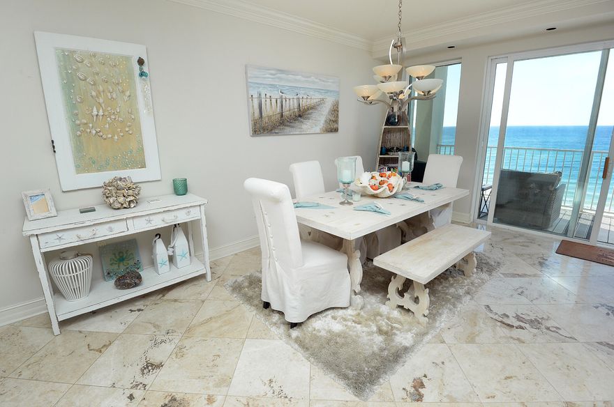 BEACHFRONT LIVING AT ITS BEST!!! Perfect living situation for anyone who wants a luxury home in a small complex that does not allow short term rentals, but long term and month to month are allowed .Compass Rose is EXACTLY what you ARE looking for! This complex of only 20 units has completed the Milestone inspection and the Seller has paid ALL of the assessments AND was the ONLY owner that also replaced all of the windows that was 'suggested' to be done during the inspection. Unit 350 has a deeded 2 car garage, a secured beach storage space , and another storage closet on the 1st floor area by the stairs. This condo comes fully furnished with ITALIAN MARBLE FLOORS, decor and updated stainless appliances! Beach service with chairs & umbrella is an owner/guest amenity! This is a MUST SEE!!! There are units in the complex that have long term tenants renting at this complex for $5500 per month! This condo would also make a great long term rental property for an investor!!