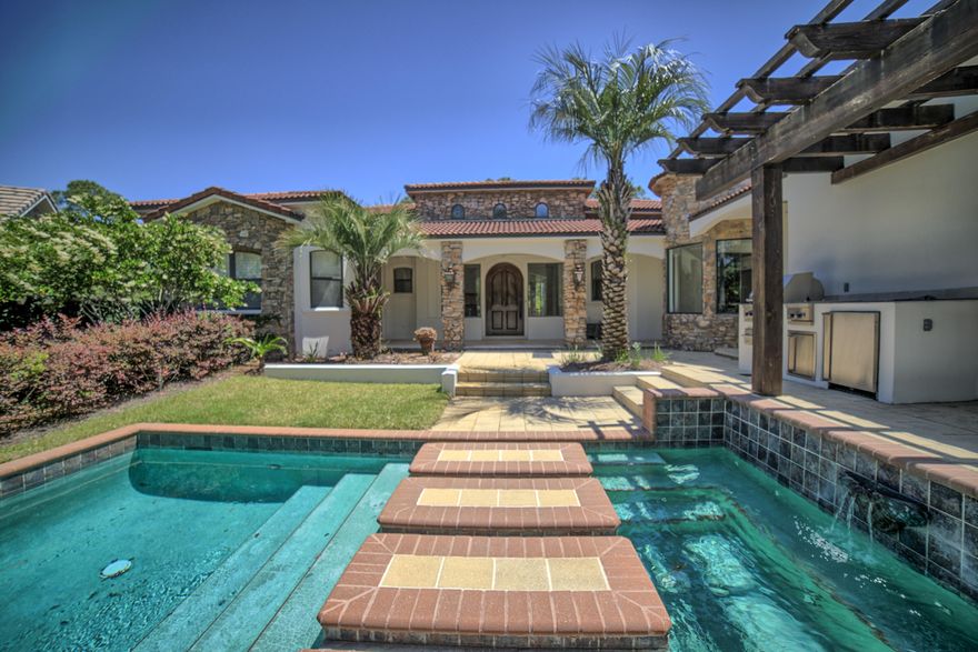 BEST PRICE HOME IN BURNT PINE. AT SANDESTIN . NEW PRICE! 1 LEVEL Home has Under gone Major Renovations and Home has been Newly Painted Inside and Out. This 3 Bedroom 3 Bath home has a Modern Open Concept Floor Plan with Tall Ceilings, Fire Place and Stone Floors thru out the Living Area of the Home and Hardwood Floors in the bedrooms. Split Floor Plan with a Large Private Master Suite with a Spa Like Master Bath and Large Walk In Closet. Large Open Gourmet Kitchen with Top of the Line Viking Stainless Steel Appliances and a 48 in. Double Oven Gas Stove. There is also a Wine Refrigerator and Ice Maker in the Dining Room. 2 Living Areas in the Home and a Great Tall Stone Fireplace. This Unique Home has a Great Private Front Courtyard with Pool, Spa, and Outdoor Summer Kitchen