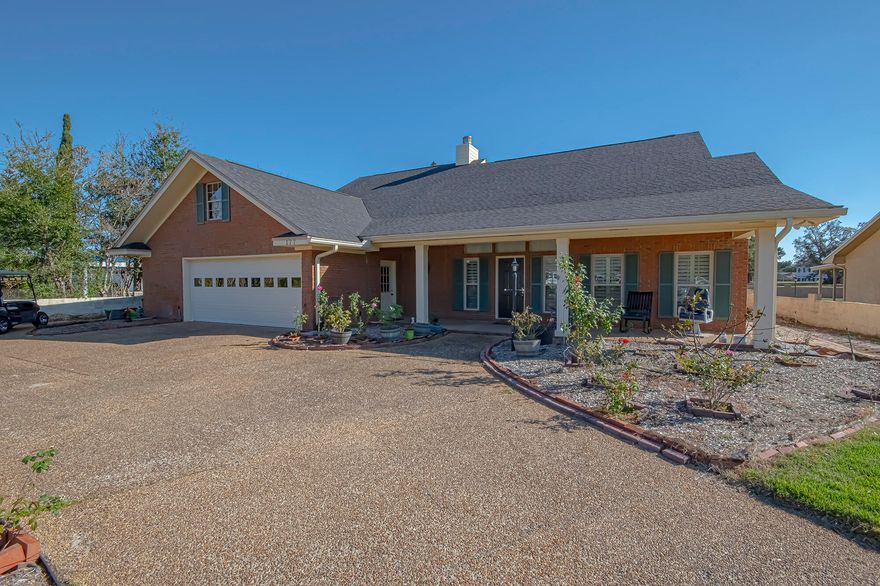 Charming 3004 sq ft All Brick Home with Private Fenced Yard and Pool! Welcome to your dream home! This beautiful 3-bedroom, 3 full bath residence features a spacious vaulted Great Room complete with a wood burning cozy fireplace, perfect for gatherings and relaxation. The kitchen with new refrigerator and microwave 2023, island on wheels and lots of cabinetry great for the chef in the family. Vaulted Open Dining Room/Wet Bar area conveniently located off great room and steps away from the backyard oasis. Luxury master bedroom and 2 master baths which include two vanities, walk-in shower, oversize tub, his and her walk-in closets with built-ins. Upstairs you will find two bedrooms sharing a jack and jill bath. Enjoy the serenity of your private yard, which boasts a stunning pool surrounded by large paver patio, ideal for entertaining or unwinding on warm days. Main floor laundry with entrance to the 2 car garage which also contains a side garage door for golf cart access. The new plantation shutters on windows ensures modern comfort while retaining its charm and allows ample natural light or privacy whichever you prefer. The inviting layout, this property is perfect for families or anyone looking to enjoy a peaceful lifestyle. New Roof 2018. Don't miss the opportunity to make this lovely home yours!