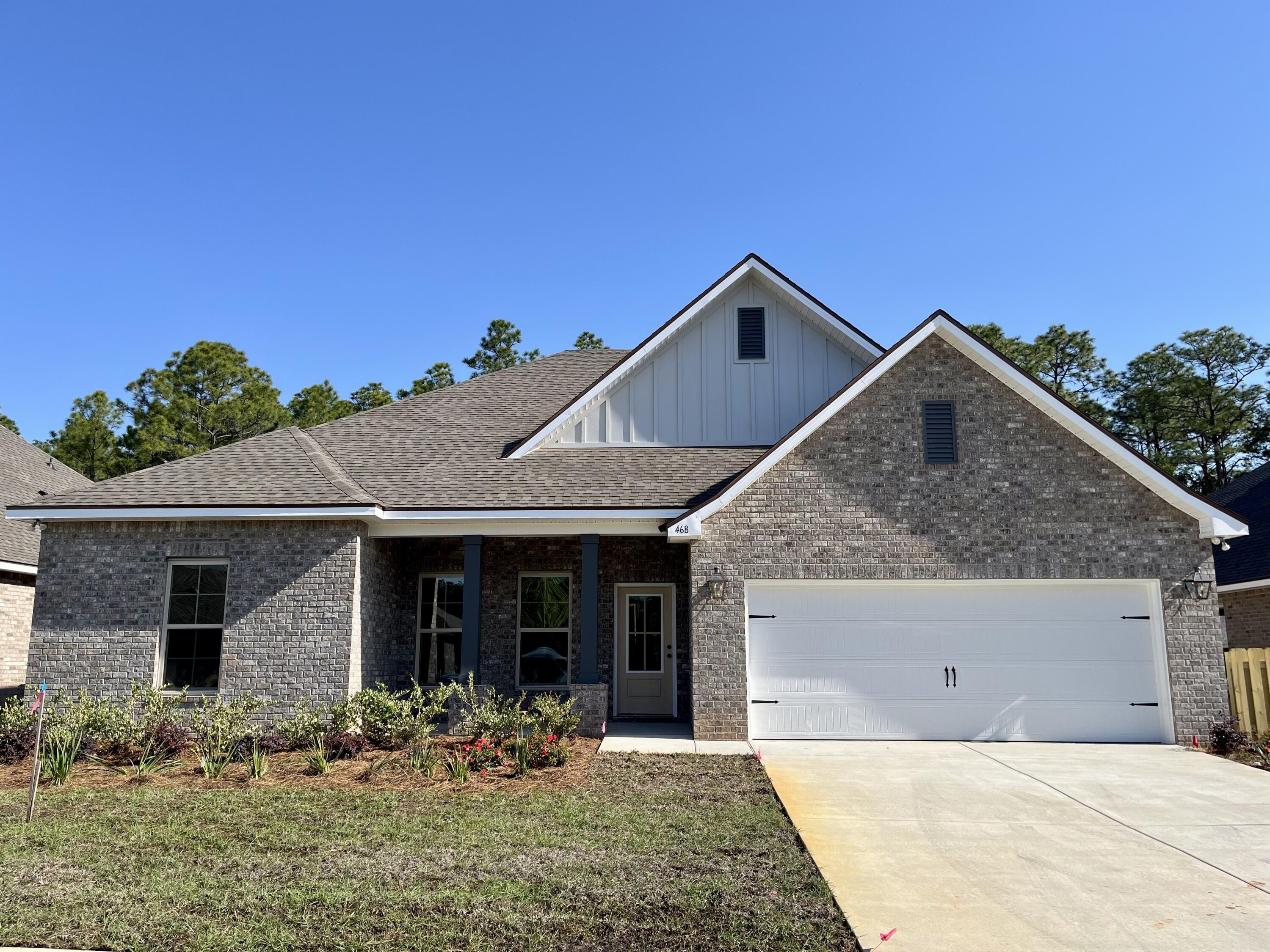 The COMSTOCK III H in Bird Song at Hammock Bay community offers a 4BR, 2BA, open design. Upgrades added (list attached). Features: double vanity, garden tub, separate custom tiled shower, and walk-in closet in master suite, kitchen island, walk-in pantry, boot bench in mudroom, covered front porch and rear patio, walk-in closets, crown molding, recessed lighting, framed mirrors, smart connect WIFI thermostat, smoke/carbon monoxide detectors, landscaping package, architectural 30-year shingles, flood lights, and more!Energy Efficient Features: water heater, kitchen appliance package, vinyl low E windows, and more! Energy Star Partner.