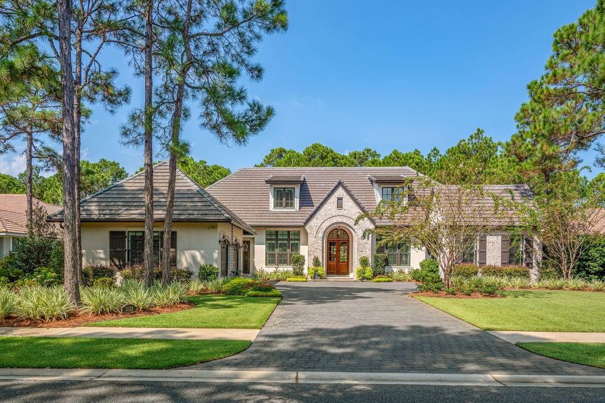 Welcome to one of the newest homes on the most desirable street in the exclusive Burnt Pine enclave of Sandestin Golf and Beach Resort. Constructed by the renowned Huff Brothers builders it features two master bedroom suites on the first floor with a separate living room and guest bedrooms on a second floor. Like all properties on Merion Drive, this lot is oversized and landscaped for privacy. It is the custom features that distinguish it from other homes on the street, from the perfectly detailed brick entryway, the coach house style garage, dormer windows on the second floor and wide open doorways with marble flooring. This is the ultimate open floor plan. The wide-open living room features classic bookcases surrounding a fireplace and looks out on a huge outdoor living area adjacent
