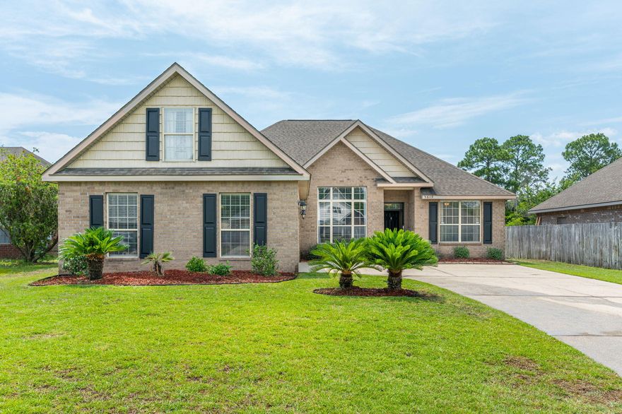 4 bedrooms PLUS dedicated office space! Renovated with style and charm this spacious home is a wonderful opportunity situated minutes from fantastic schools, beautiful beaches and bases. You'll be impressed the moment you pull up with a side entry garage. The entry boasts high ceilings that lead into a spacious dining room to the left of office / den to the right. The kitchen is gourmet! Beautiful quartz countertops, stainless appliances and plenty of cabinets and prep space for the Chef of the house! With an open concept you'll be overlooking a sizable living room while you prep in the kitchen.  The primary bedroom is tucked away with a split floorplan for privacy. You'll find trayed ceilings, large primary bathroom with walk in closet space. 2 additional bedrooms are downstairs