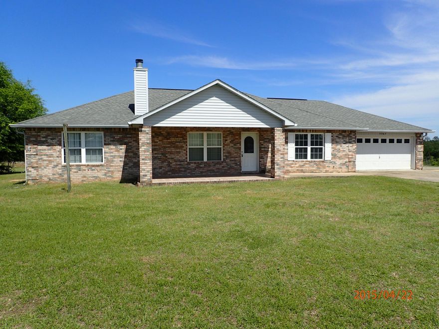 This REO property is located mins from Crestview just north of Hwy 90 on Hwy 393. This 1800sf home was built in 2003 and has split bedroom, 3 bedroom and 2 baths. Living room is large and open with large fireplace. Just off the kitchen is a dining area and galley kitchen leads to laundry room and garage. The property sits on over 6 acres and is completely fenced. Very difficult to find homes in this condition on this acreage at this price, though home needs some repairs, this is certainly a must see if looking for acreage and location. Call today to set up your showing.