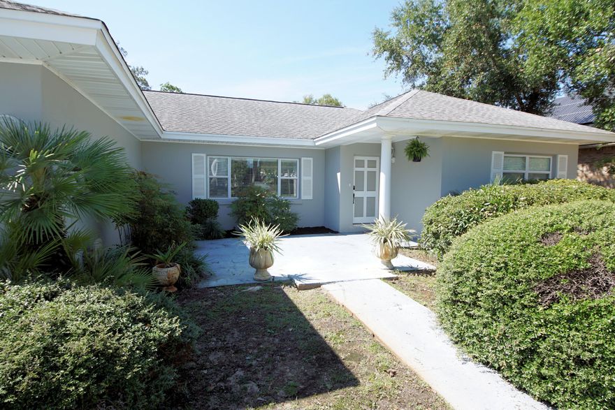 Updated! Pool! 2 Car Garage! Large Lot! This is a Must See Home on Beautiful Sudduth Cir.  Just a Short Distance to the Yacht Club, Ferry Park, Shopping, and Entertainment.  Updated and Ready for You to Move In! Gorgeous Wood Look Tile Throughout. 4 Sliding Glass Doors that Lead to the Pool and Large Privacy Fenced Back Yard. 2 Bedrooms on One Side of the House with Another Bedroom and Full Bath on the Opposite Side.  The Large Laundry Room Could Hold a Small Craft Area or Office.  Buyer to Verify all Measurements.