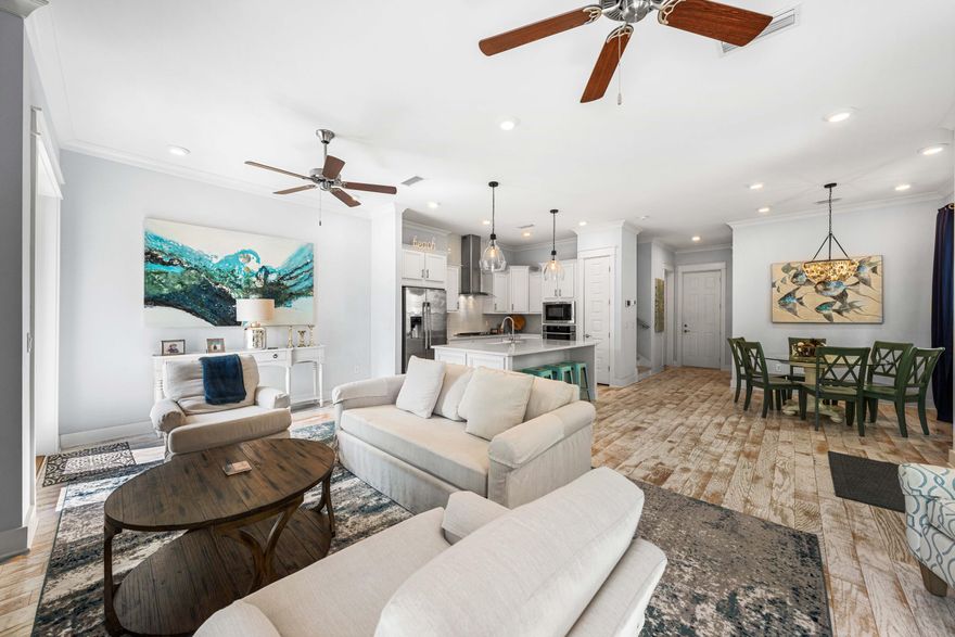 This PROMINENCE Townhome is PRISTINE!! Owners have meticulously maintained this home and are ready to sell! The open concept LIVING/DINING/KITCHEN with high ceilings 'LIVES LARGE' & there is room for the entire family to gather. Premium finishes throughout include Quartz countertops, stainless appliances, & oversized island. French doors open onto the deck overlooking the green space & it's a short walk to one of the 2 community pools. Upstairs the PRIMARY SUITE is spacious and has a bath that feels like you are at the spa. 2 Guest bedrooms & guest bath on 2nd floor. Across 30-A is 'CHILL' with entertainment & food venues for all palates. 2 car GARAGE has built-in Owners closet for beach toys & bikes. Jump on the bike path & ride to ALYS BEACH & ROSEMARY. DEER LAKE State Park is next door