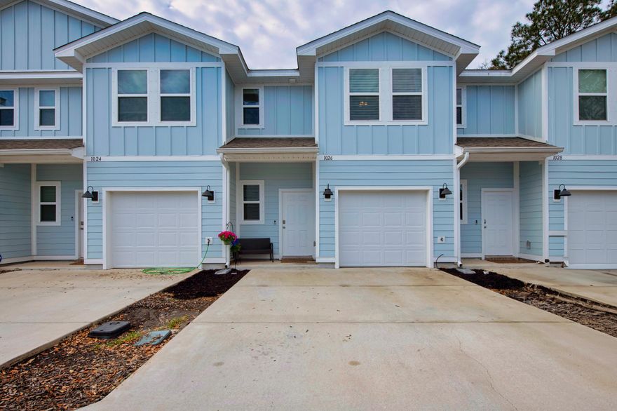 Everything You Need, Plus Everything You WantThis isn't just a townhome--it's the townhome you've been waiting for! Nestled in the vibrant Cooper's Landing community, this stylish, low-maintenance home offers unbeatable upgrades and a location that puts you close to everything--the base, beach, shops, and restaurants!Featuring a bright open-concept floorplan with granite counters, a three-seater bar, and a full suite of stainless appliances, including a refrigerator, dishwasher, range, microwave, washer, and dryer, this kitchen is made for modern living. The Smart Home Connect System, video doorbell, and automated lighting add extra convenience and security.What makes this home really special? The rare one-car garage, a premium water softener, and a whole-house water treatment system located in the garagethe kind of features you don't typically find in townhomes! Add in fabric hurricane protection, beautiful finishes, and Hardi Board siding for timeless curb appeal, and you've got yourself a standout property.
Act fastthis townhome is unlike anything else in the neighborhood. Schedule your private tour now!