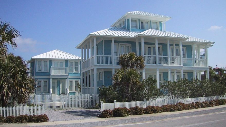 ''Rock Lobster and Love Shack'' is an extraordinary property consisting of a large main house, guest house, and swimming pool, nestled onto a corner lot across the street from a beach walkover - what could be more perfect? This properties is a hot on the rental property with lengthy history and perfect for large families, families vacationing together, attending weddings, or family reunions. With six bedrooms and 5-1/2 baths, there is room for everyone. The large living area, which looks out over the Gulf of Mexico, has a fireplace and adjoins the kitchen so everybody can cook and visit at the same time. True Southern double loaded porches grace the main and guest house.