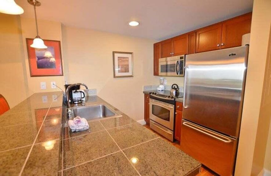 This fantastic 1-bedroom, fully furnished condo offers beautiful views of the bay and golf course from the 7th floor. Enjoy sipping your favorite beverage while sitting outside on the balcony taking in the serene views. Wood look tile flooring extends throughout the condo, ideal for sandy beach living and easy maintenance. The fully equipped kitchen features stainless steel appliances with a smooth top range. The Grand Sandestin offers a community pool, hot tub, on-site fitness center, and is just a short stroll away from The Village of Baytowne Wharf with great dining, shopping, and fun entertainment options. Come relax and enjoy the resort lifestyle!