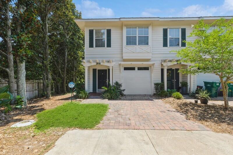 This stunning corner unit townhome offers an exceptional blend of modern upgrades and prime location, making it the perfect choice for those seeking the best of coastal living. This home features 3 generously sized bedrooms and 2.5 bathrooms.Situated in the heart of Destin, you're just minutes away from the beaches and shopping destinations.Both full bathrooms upstairs have been completely renovated with modern fixtures and finishes.Enjoy waterproof LVP flooring in bedrooms and oversized tile throughout the first floor .A AC unit was installed in 2020, and the hot water heater was replaced in 2021. Crown molding throughout the home adds a touch of charm.The kitchen has granite countertops and stainless steel appliances. There is a cover back porch and a garage. Come take a look today.