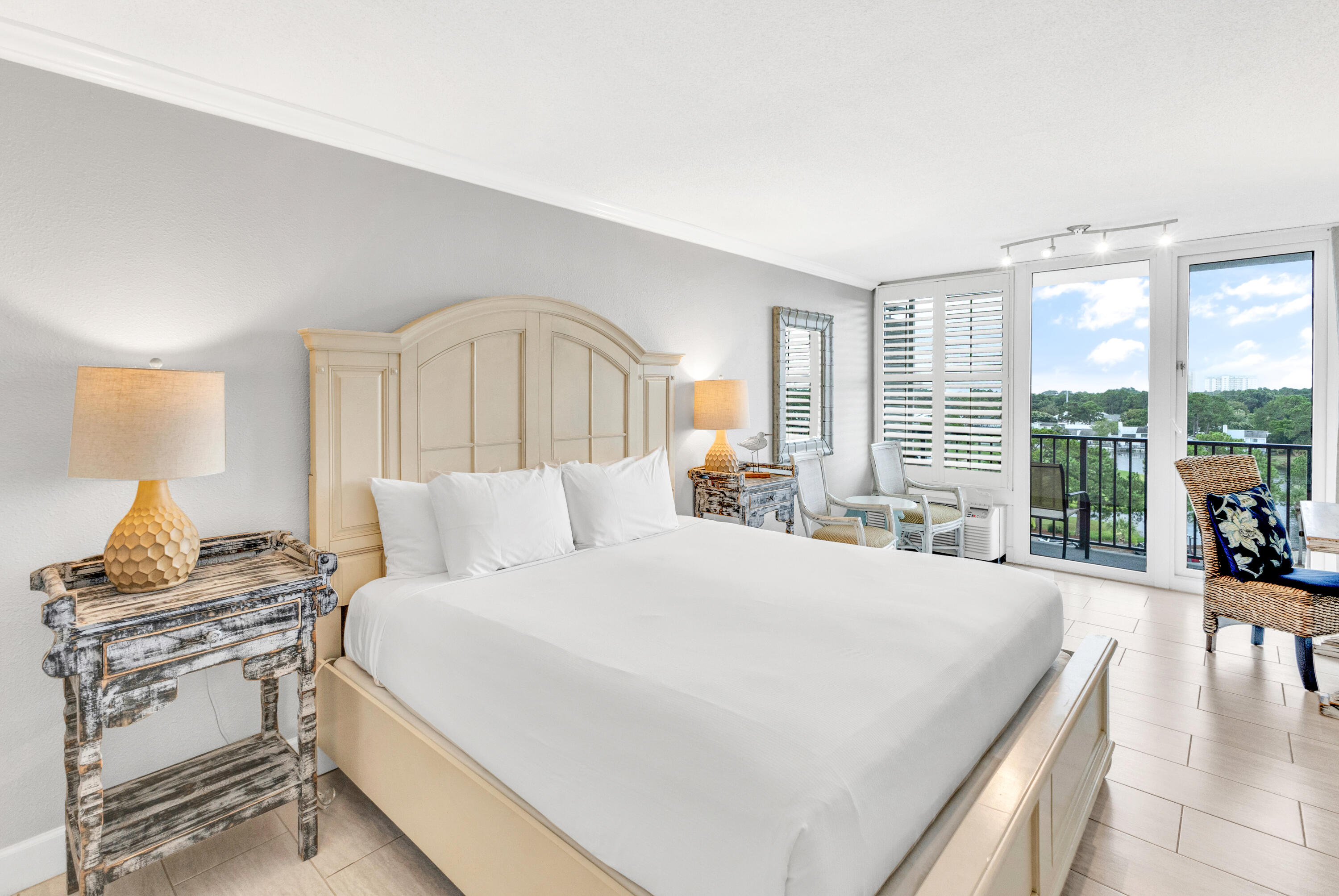 This beautifully updated top-floor studio offers stunning resort views from its private balcony. The space has been thoughtfully remodeled, featuring a sleek modern bathroom with a walk-in shower and updated vanity, an upgraded kitchenette with granite countertops, tile flooring, and tasteful furnishings throughout.Sold fully furnished, the studio includes a comfortable king bed, a cozy sitting area, and a kitchenette equipped with a mini-fridge and microwave--perfect for short or extended stays.Enjoy the recently updated and only bayside pool in the resort. Ideally located next to the Links Golf Course and within a short distance of the Linkside Conference Center, Sunset Bay Cafe, and the Sandestin Fitness Center.Bayside at Sandestin is a pet-free community, with the exception of service animals as defined by the Americans with Disabilities Act.