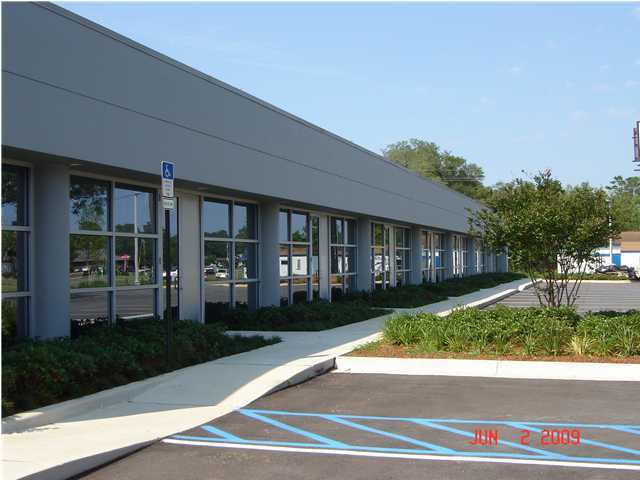 This property is one of the nicest commercial pieces of property in town. It is one of the closest commercial pieces to Eglin Air Force Base, and it is also less than a mile from the new Okaloosa County Courthouse and Golf Course. Many of the units are close to complete with granite countertops, spacious offices, and natural light provided by slender courtyards containing glistening waterfalls that run the length of the building. One of the areas premier law firms anchors one end of the building covering three units and has invested considerable sums to finish out the interior of their units. The property is to be sold ''As Is,'' and is owned by a local bank who will consider all offers and will finance the purchase at very favorable rates and terms for a qualified buyer. Space is