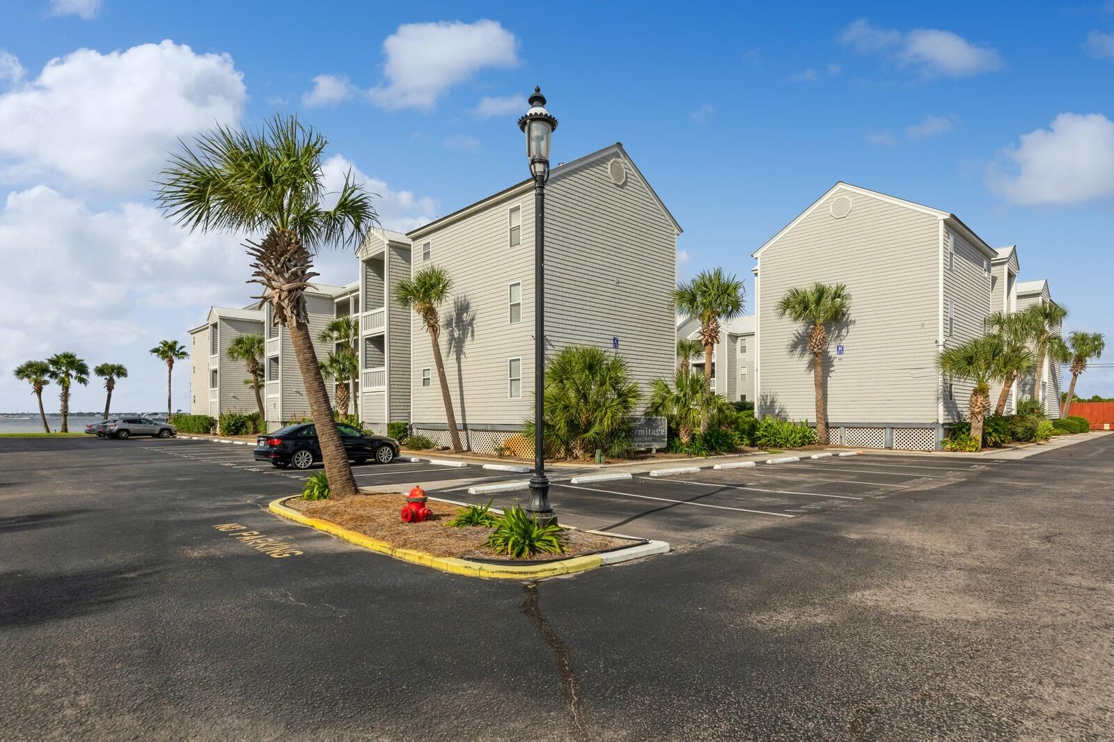 Best of both worlds on Okaloosa Island, the Beach and the Bay! Bay front community with stunning view of the Choctawhatchee Bay, including a small private sandy beach and a 300 ft fishing/boating pier. A community pool and picnic area are also included along the bay front. The beach is directly across the street with easy access to John Beasley Park, the Boardwalk, and the Okaloosa Island Fishing Pier. Convenient first floor condo with designated parking space directly in front of unit. Pool view and bay view from balcony.