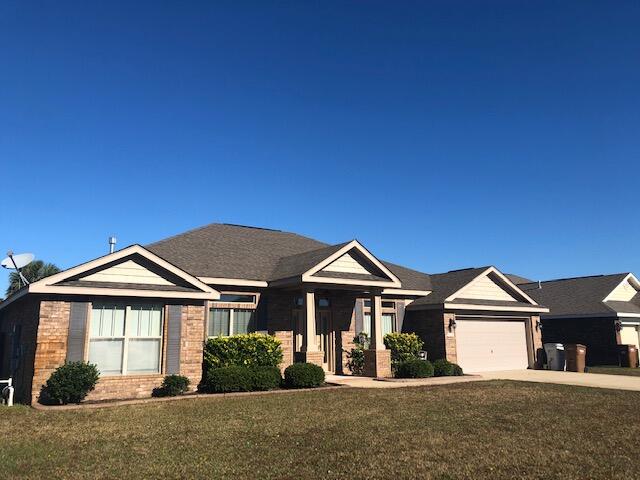 NEW PRICE~NEW PAINT-NEW CARPET-This 4 bed/3 bath lovely home is in the much sought after subdivision 'The Meadows' located in East Navarre. Tiled Foyer leads to double glass French doors and into a room that could be used as an office, formal living room or flex space. Formal Dining room takes you to the well appointed kitchen that comes equipped with custom wood cabinets, storage drawers, granite counter tops, tile floors, full appliance package and Walk in Pantry. Breakfast bar and large eat in area. Split floor planwith master off the kitchen. Lots of space in the Owner's suite with ceiling fan and door to screen in porch. Owner's bath has all wood cabinets, granite top double vanity. Walk in shower with European tile, triple heads and enough space that you would truly feel as if
