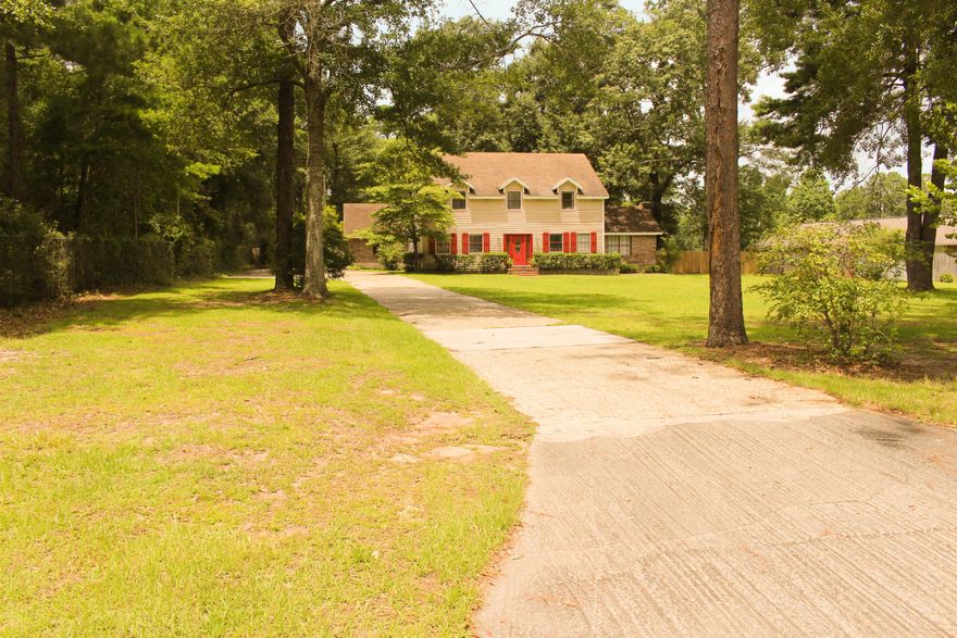 Welcome Home! This beautiful colonial style home sits on well over an acre in a very desired area of north Crestview. Property features a HUGE, level lot with a saltwater treated in-ground pool! This is the perfect home for someone looking for the convenience of town, but the privacy of living out in the country. Home has 4 bedrooms with an option for a 5th bedroom located on the main floor that features a closet and half bath. Gorgeous kitchen with TONS of storage and center island adjacent to living room. Master bath and guest bath upstairs have updated custom cabinetry. Huge utility room, built in bookcases, and a fireplace also add to the detail in this great home. Just under 3000 SF of living space on an incredible lot. Garage has huge extended storage area. Seller to provi